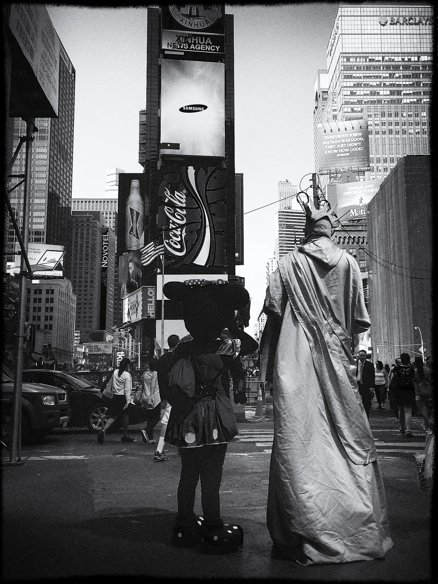 Minnie and statue of liberty at Times Square