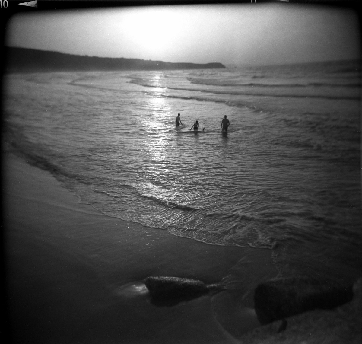 Surfisti a Punta Penna