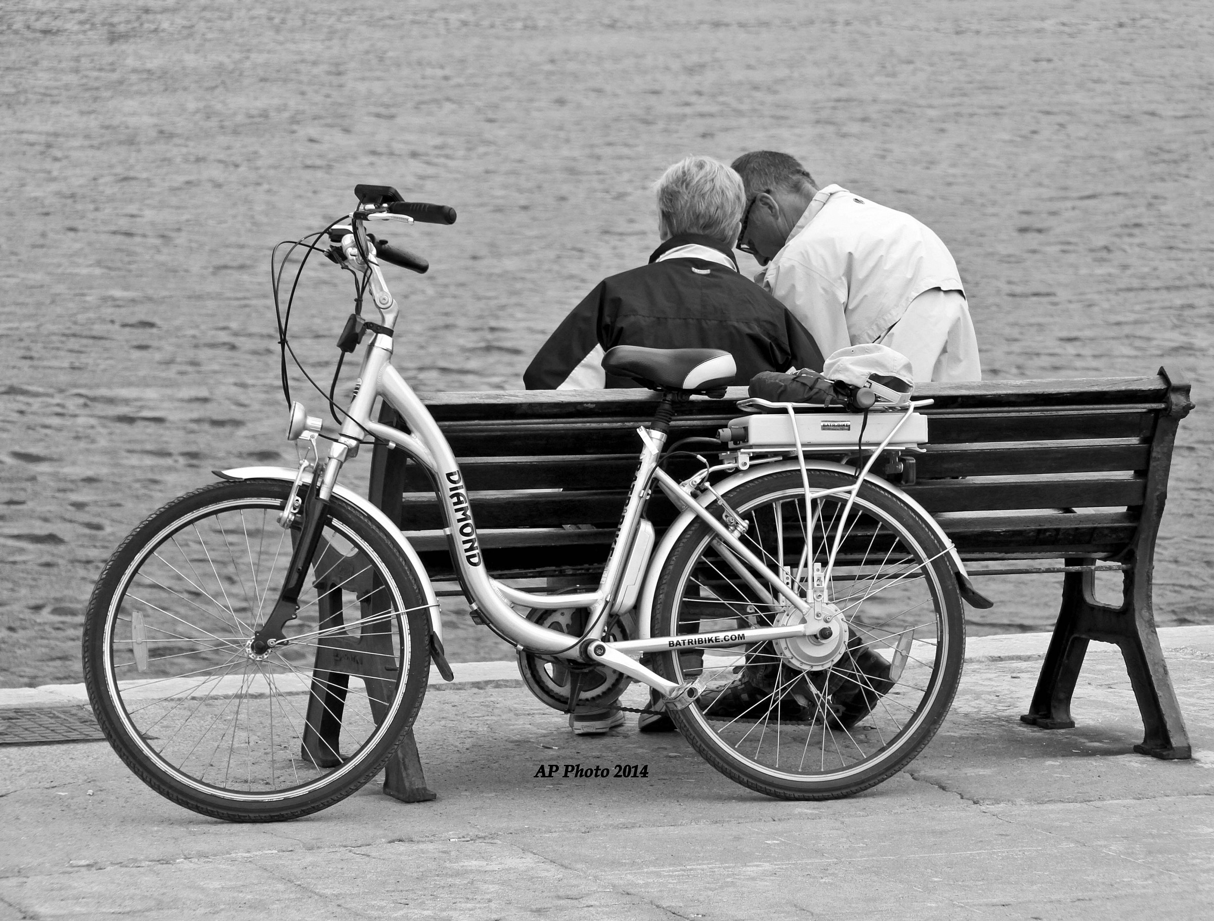 Cefalu - a couple observes the landscape