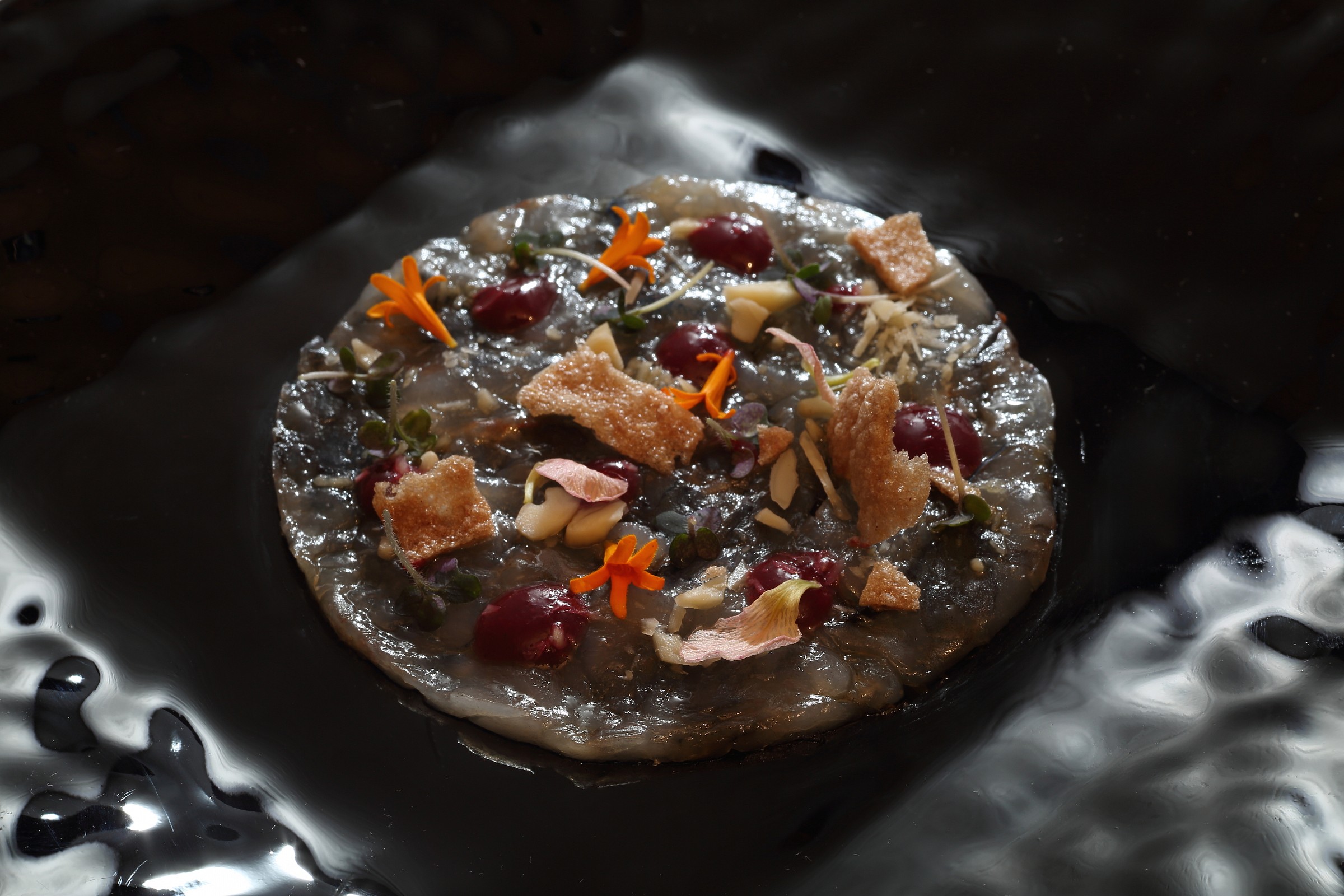 Carpaccio of blue shrimp, lychees and wheat will