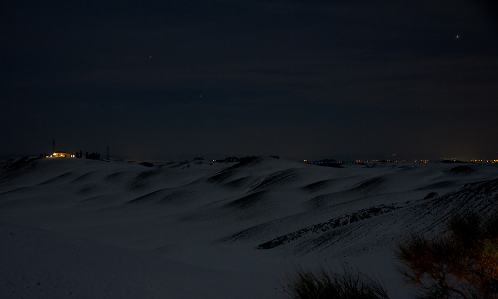 Crete Senesi, the snow illuminated by the moon
