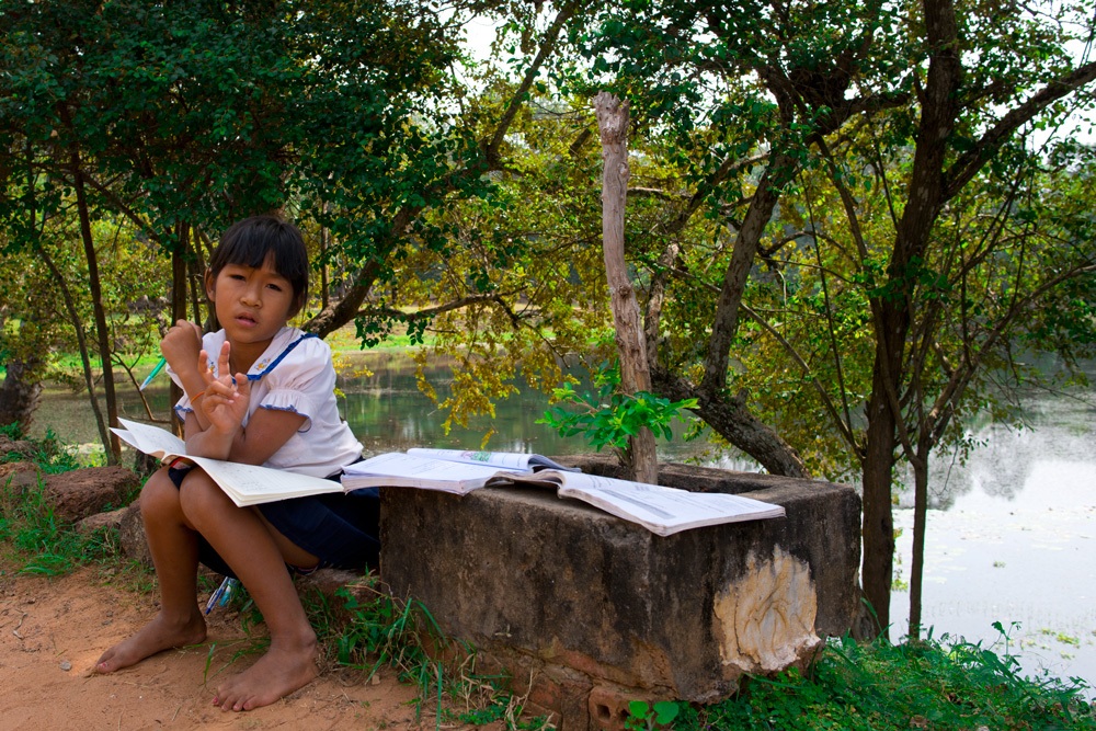 Angkor Wat: children preparing Their homework