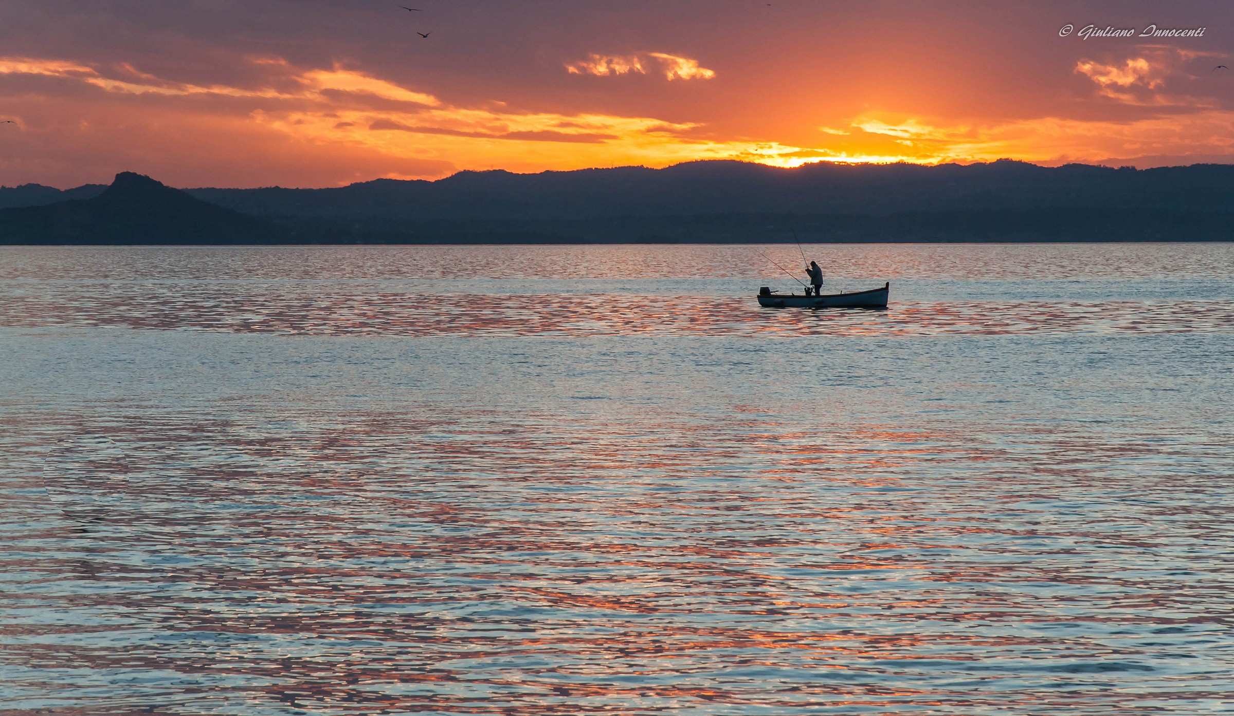 fisherman at sunset