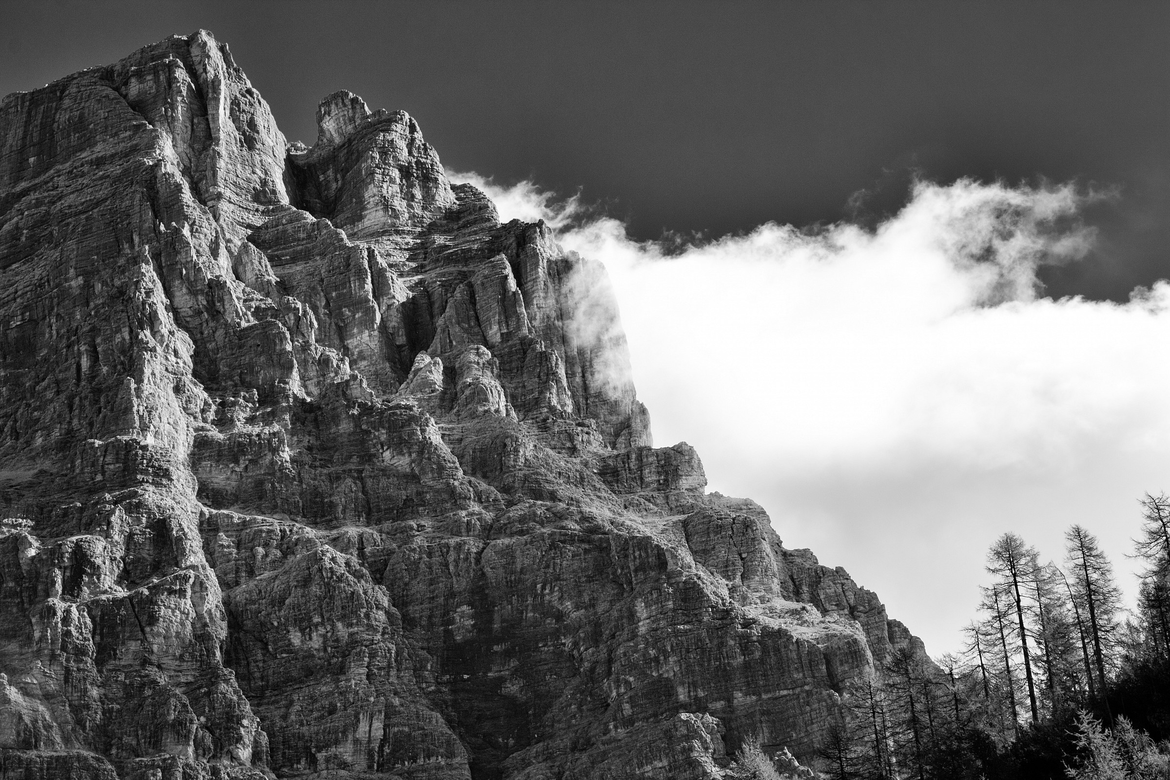 a cloud touches the top of the Pelmo