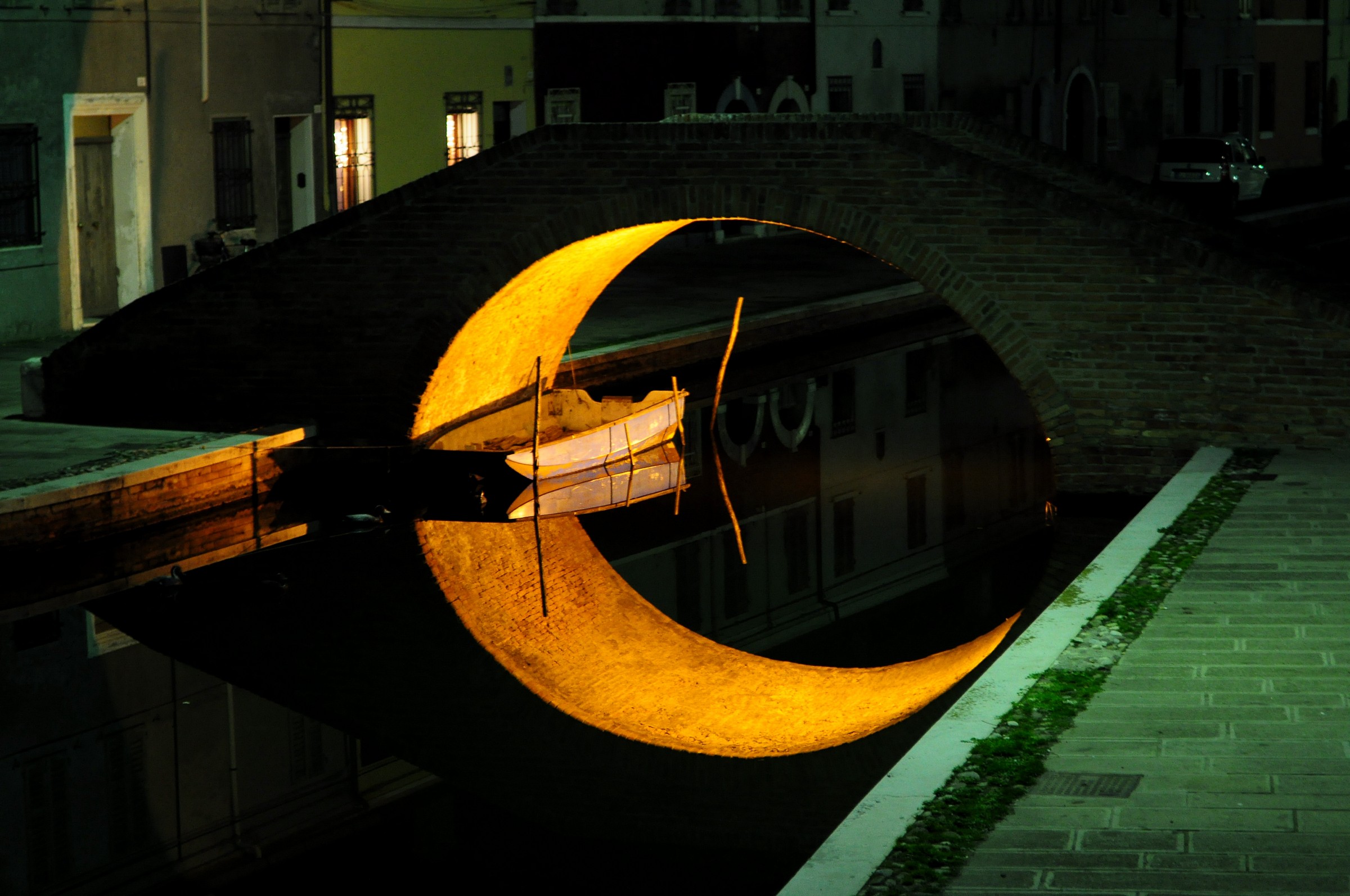 Artificial moon between the bridges of Comacchio