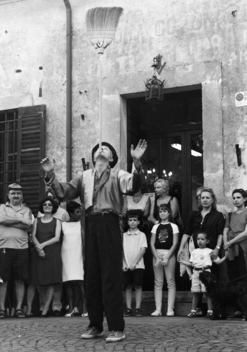 acrobatic juggler and his magic broom