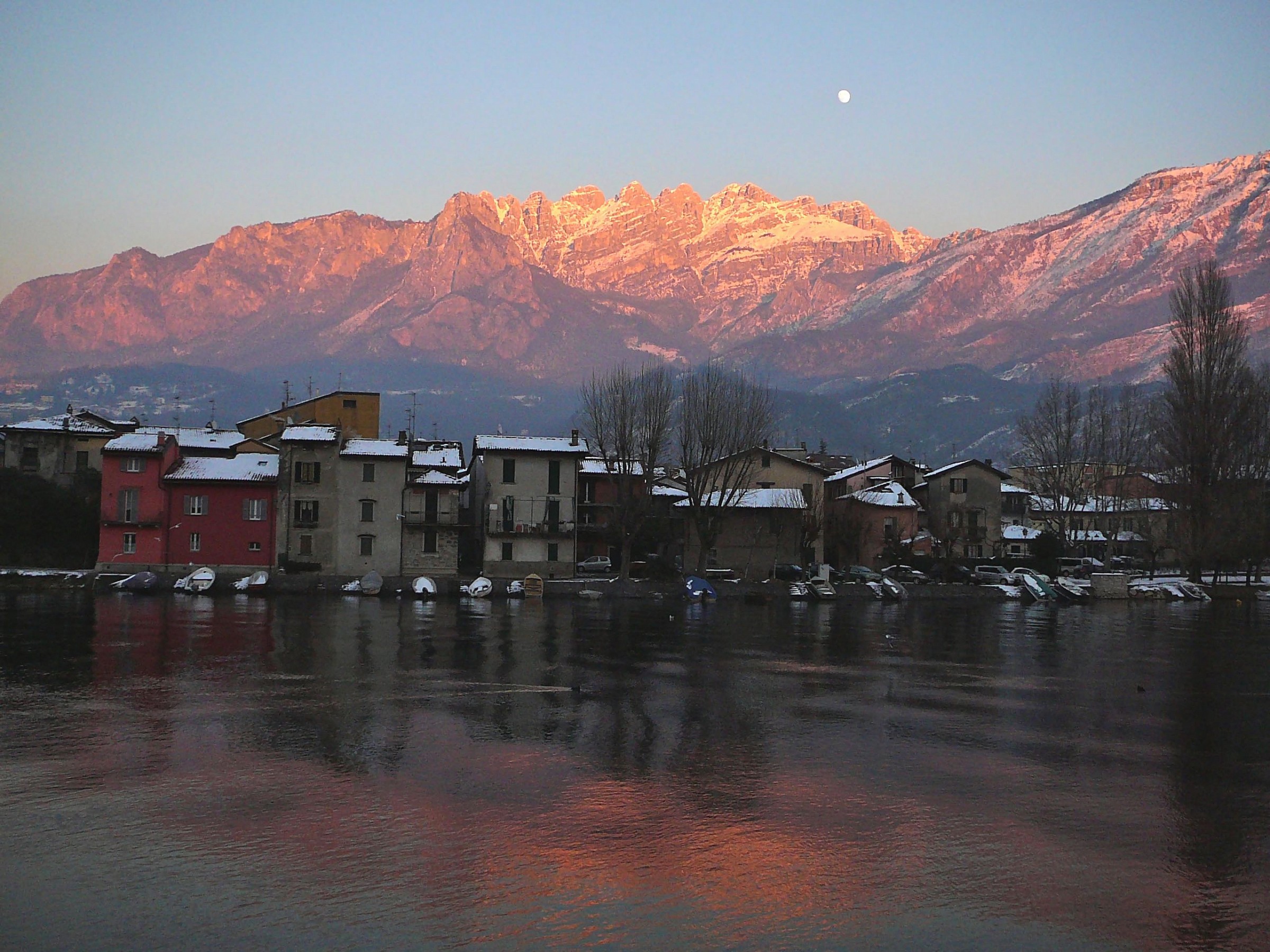 Pescarenico, winter sunset with moon on Resegone
