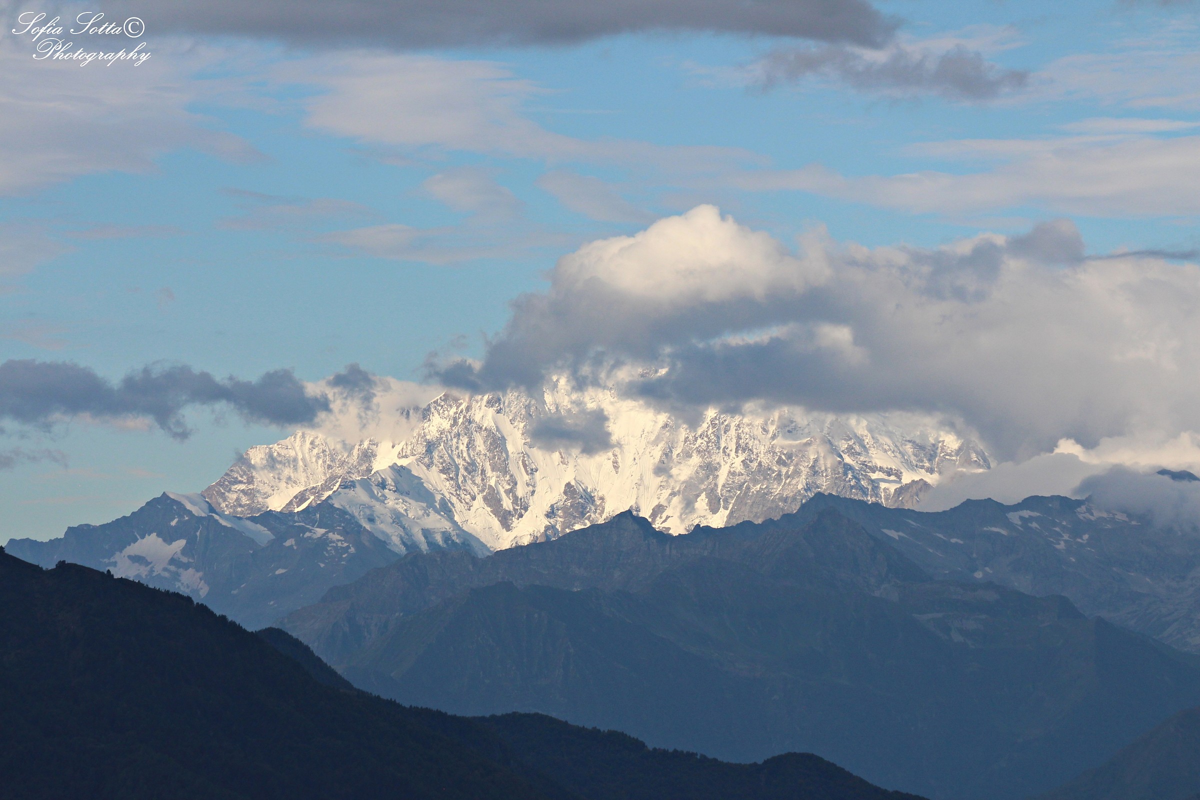 Snow, Mountains and Clouds