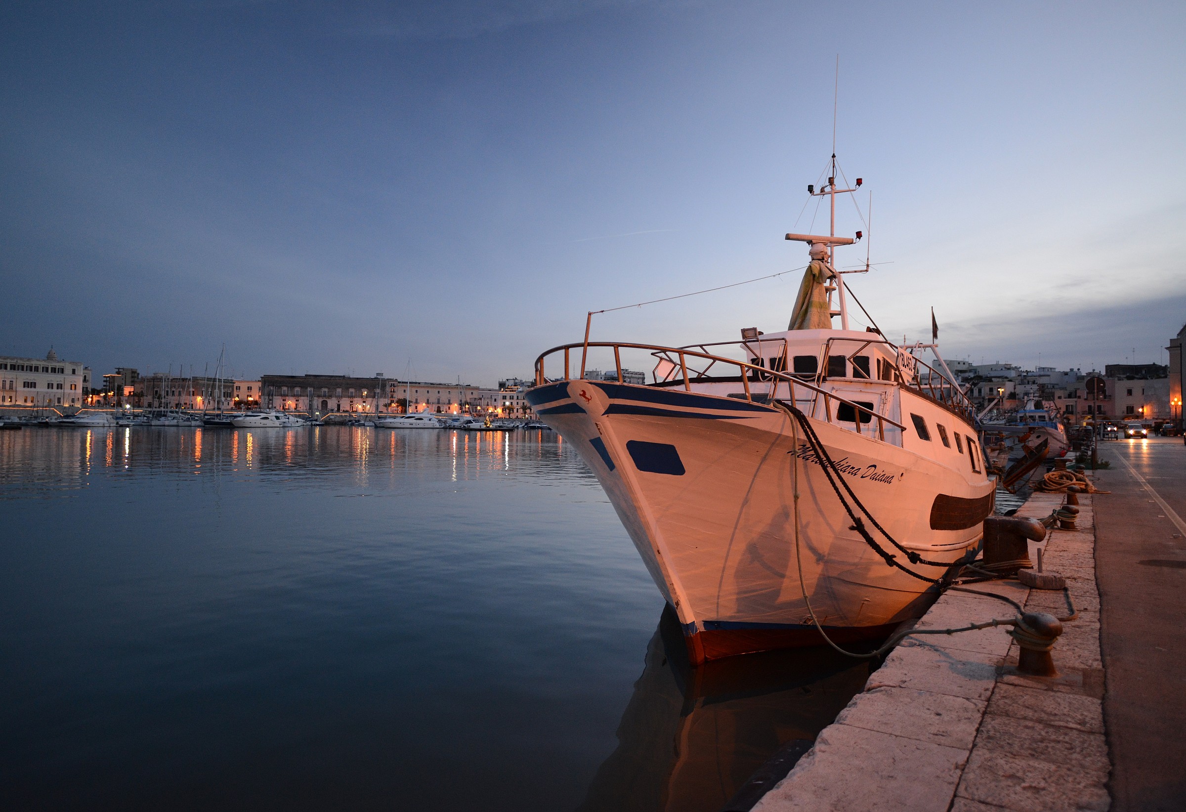 Now the blue harbor of Trani