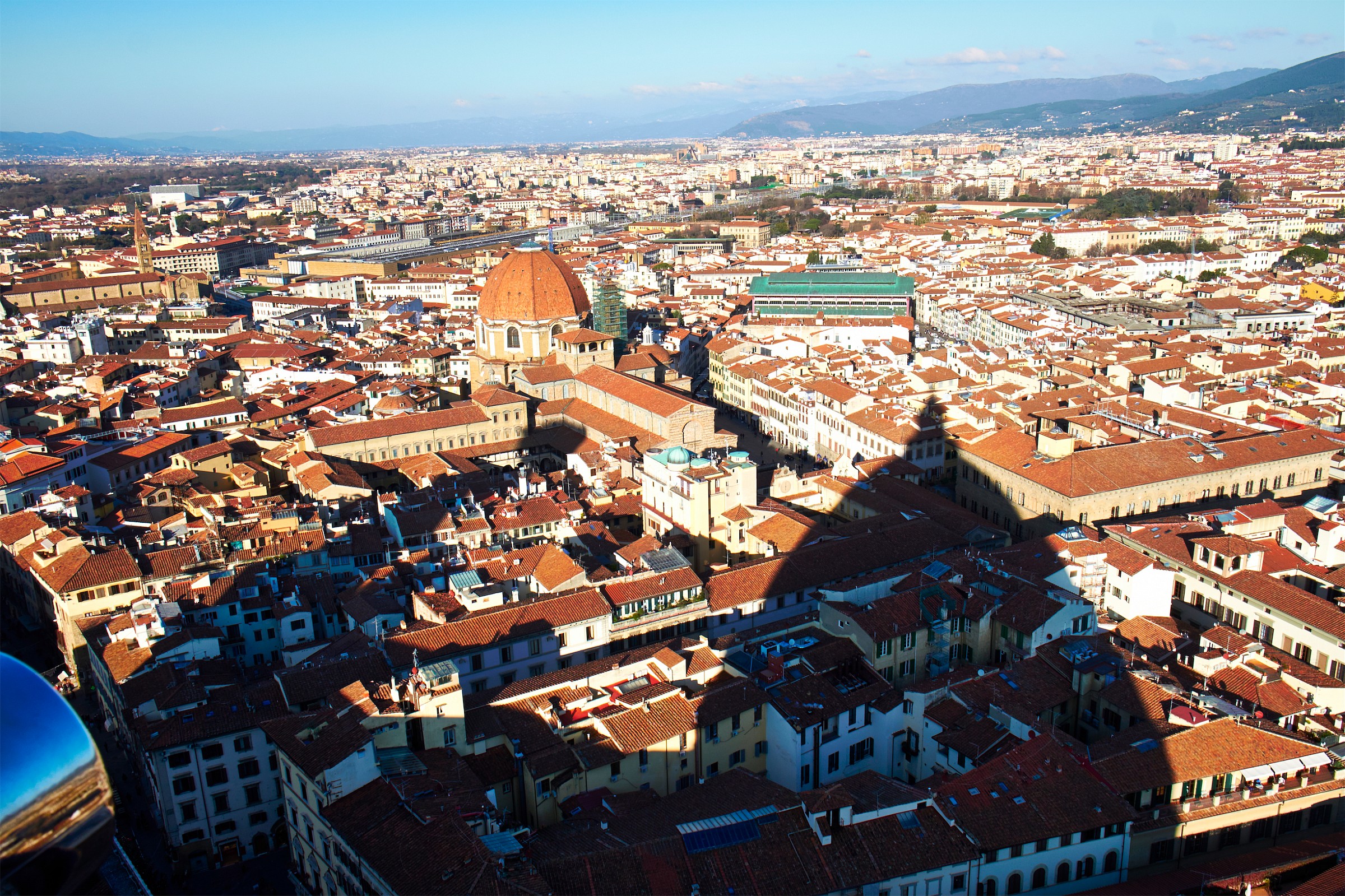 As the shadow of a giant watching over the city ?.
