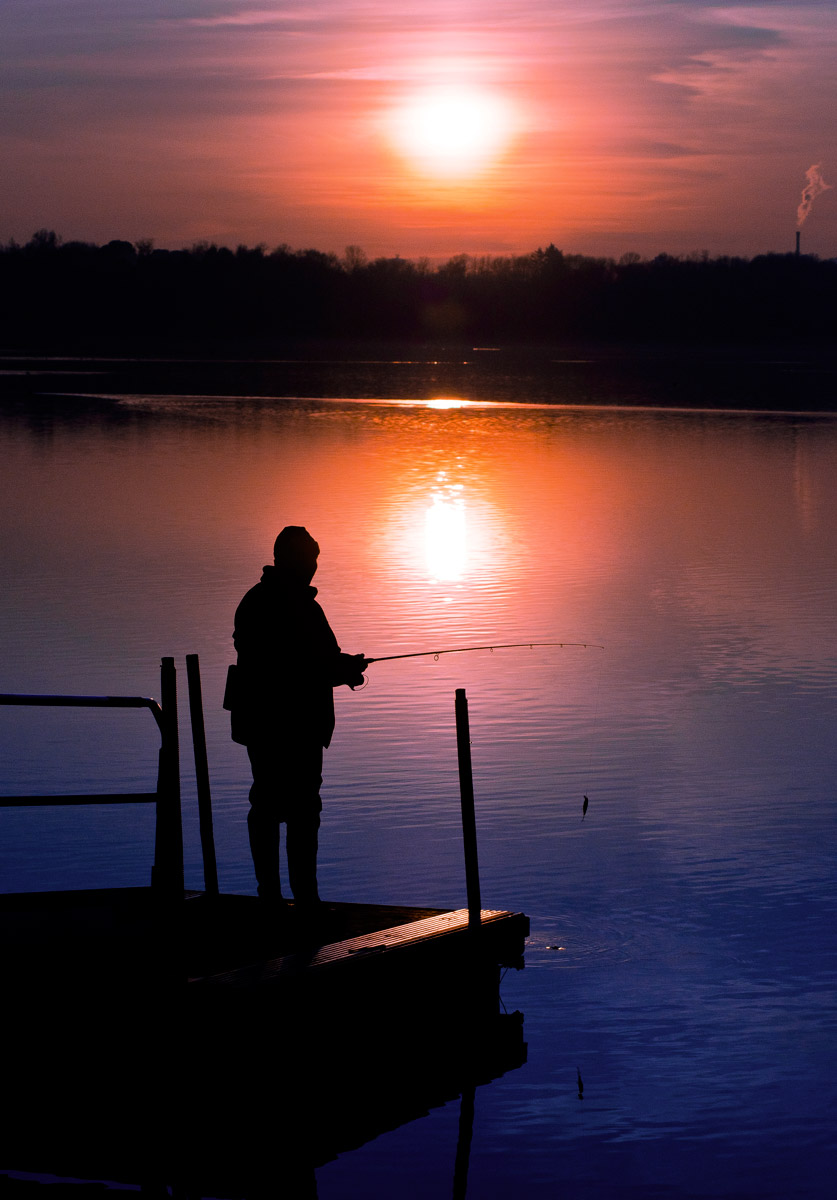 fisherman at sunset