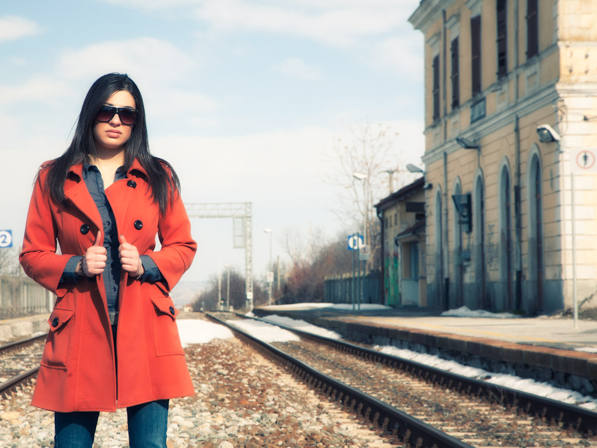 The girl with the orange coat