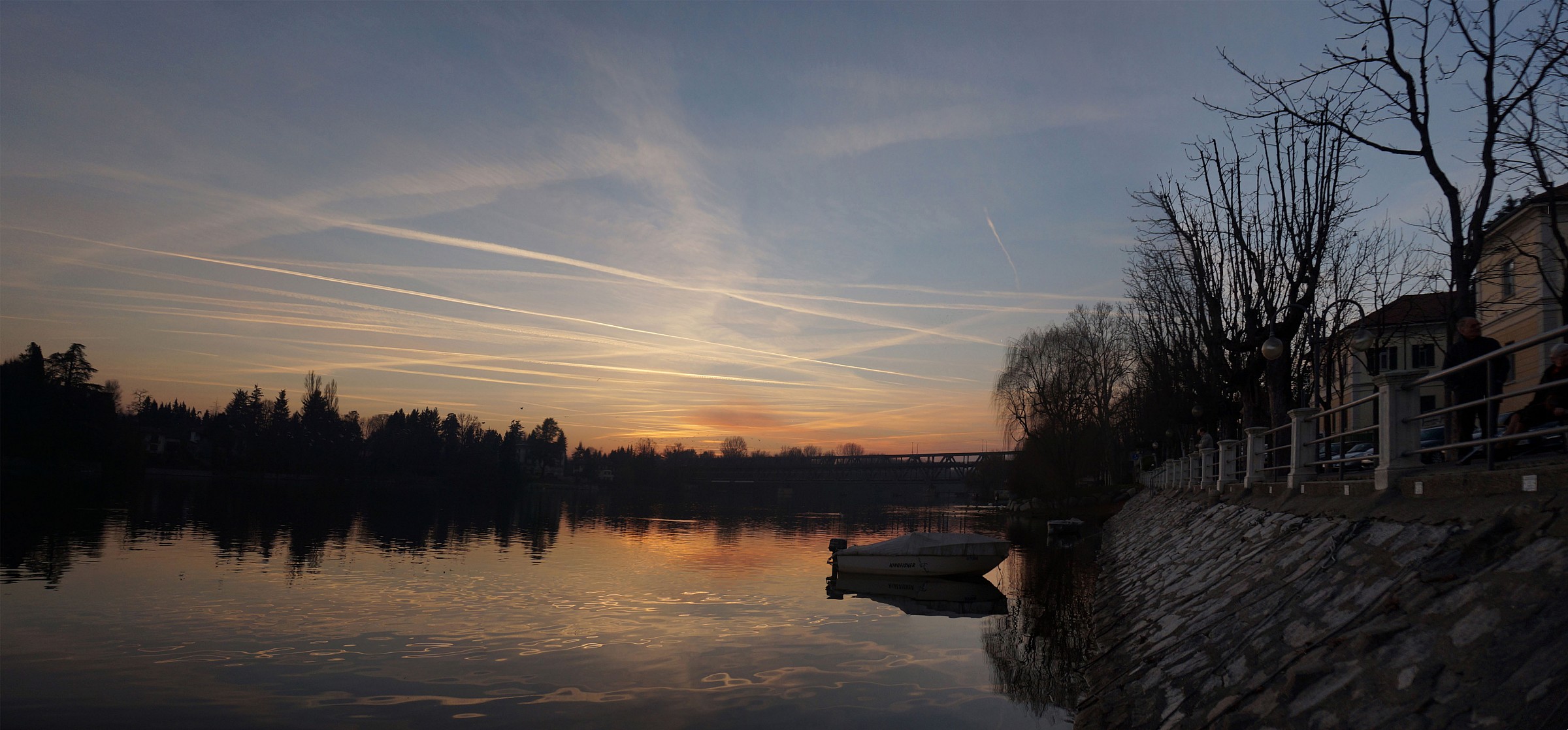 Sunset Epiphany with contrails of airliners