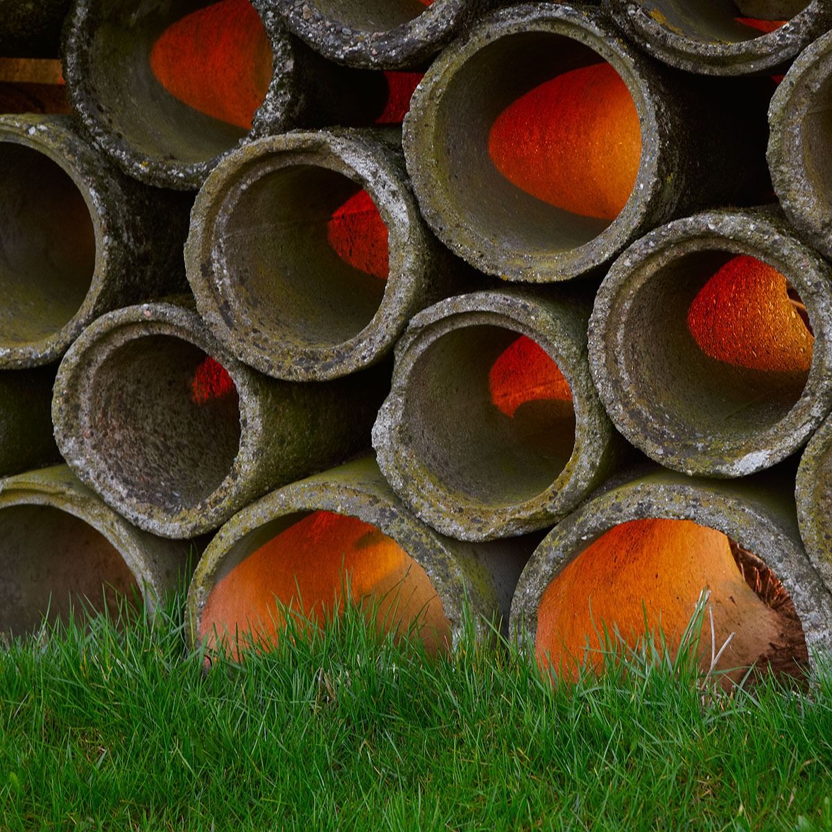 Abbiategrasso: Luggage concrete pipes at sunset