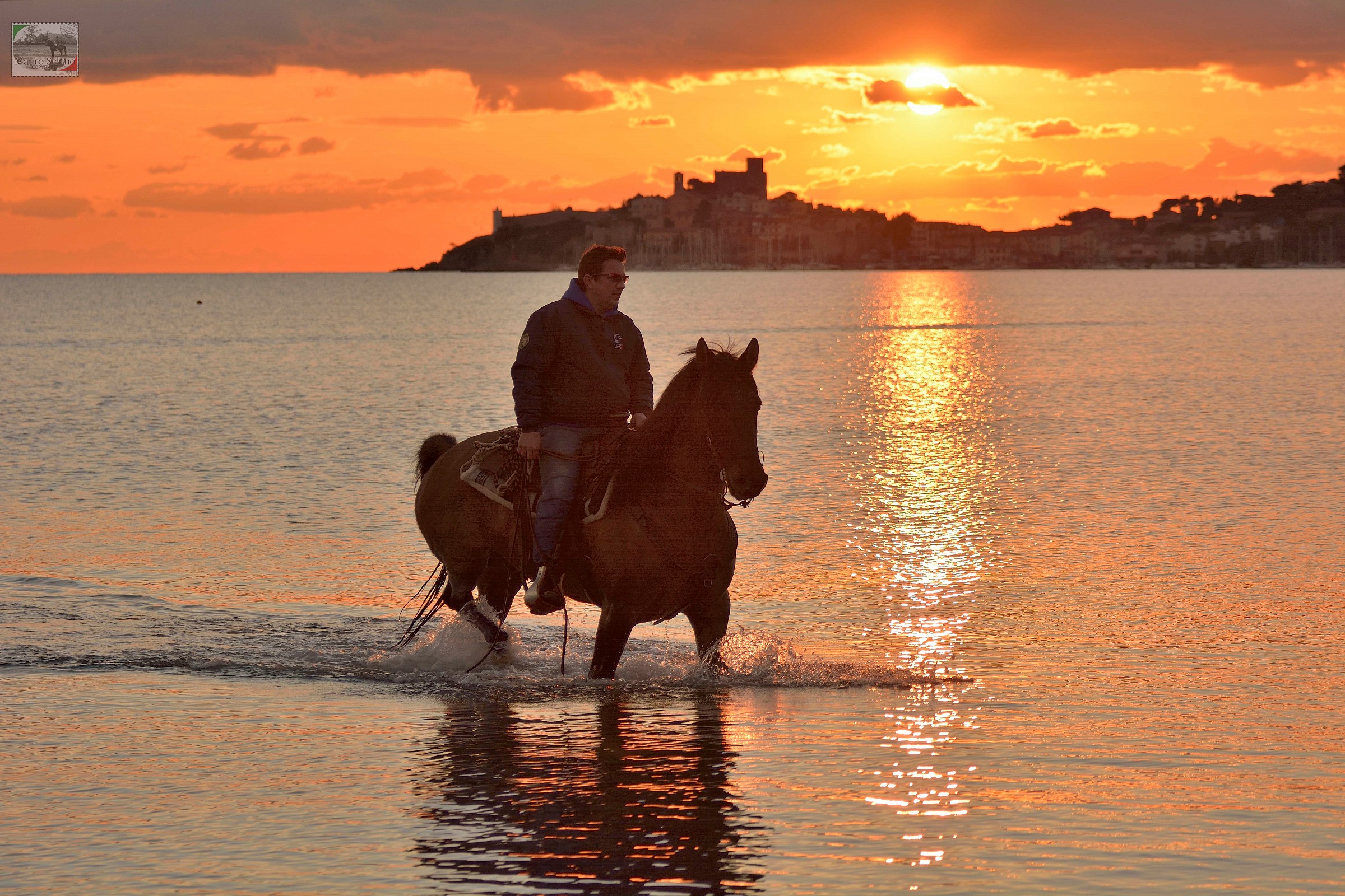 Talamone tramonto a cavallo