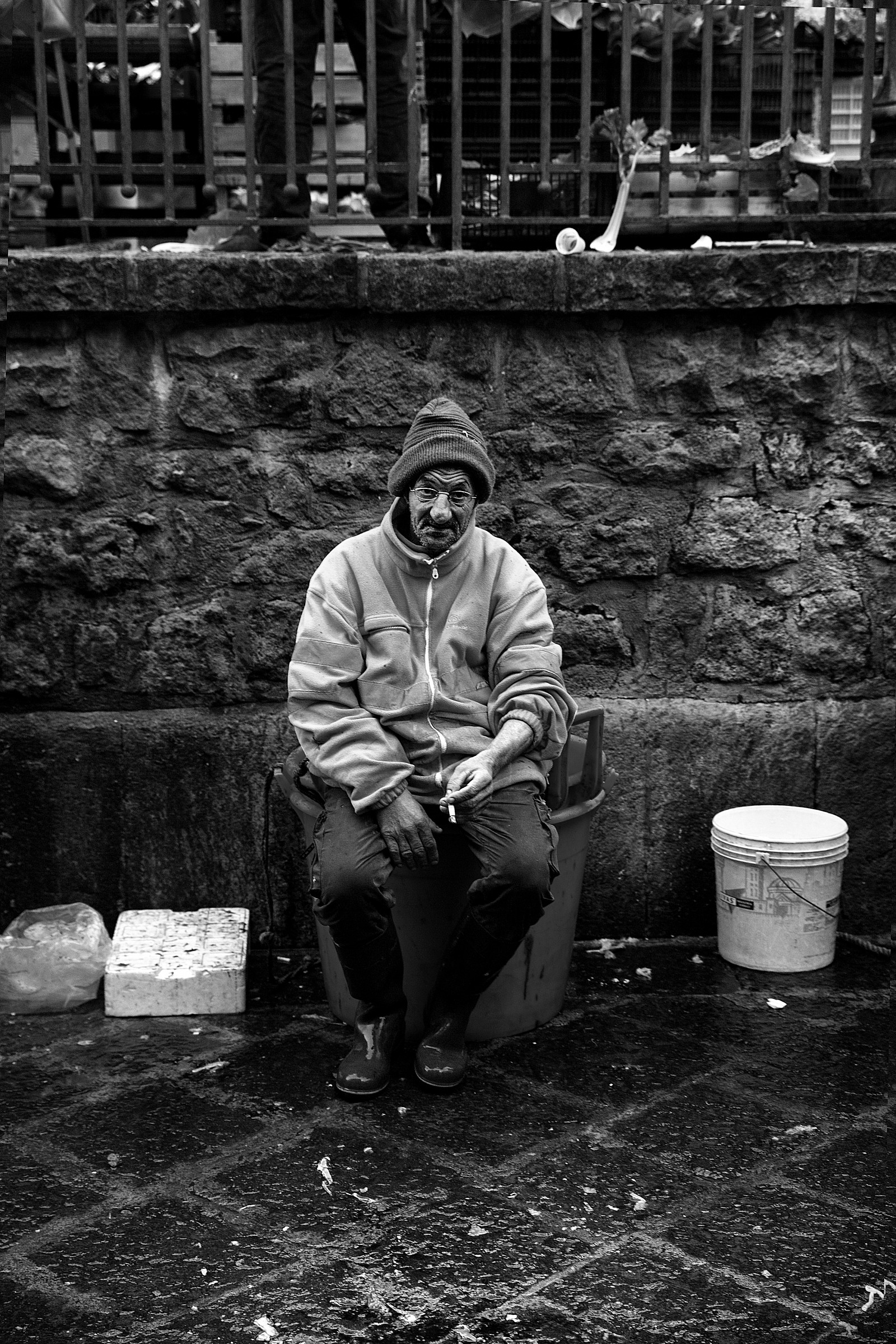 Cigarette break at the fish market in Catania