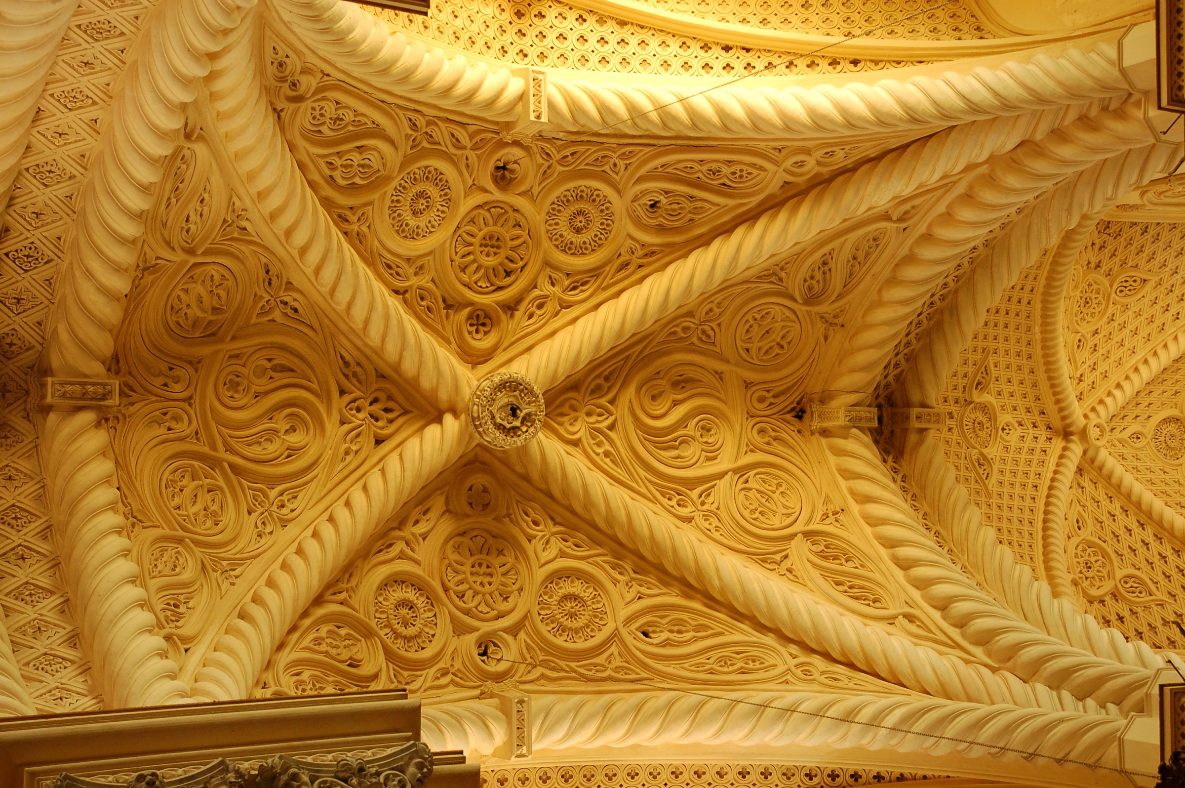 Sicily. In church, with his eyes.