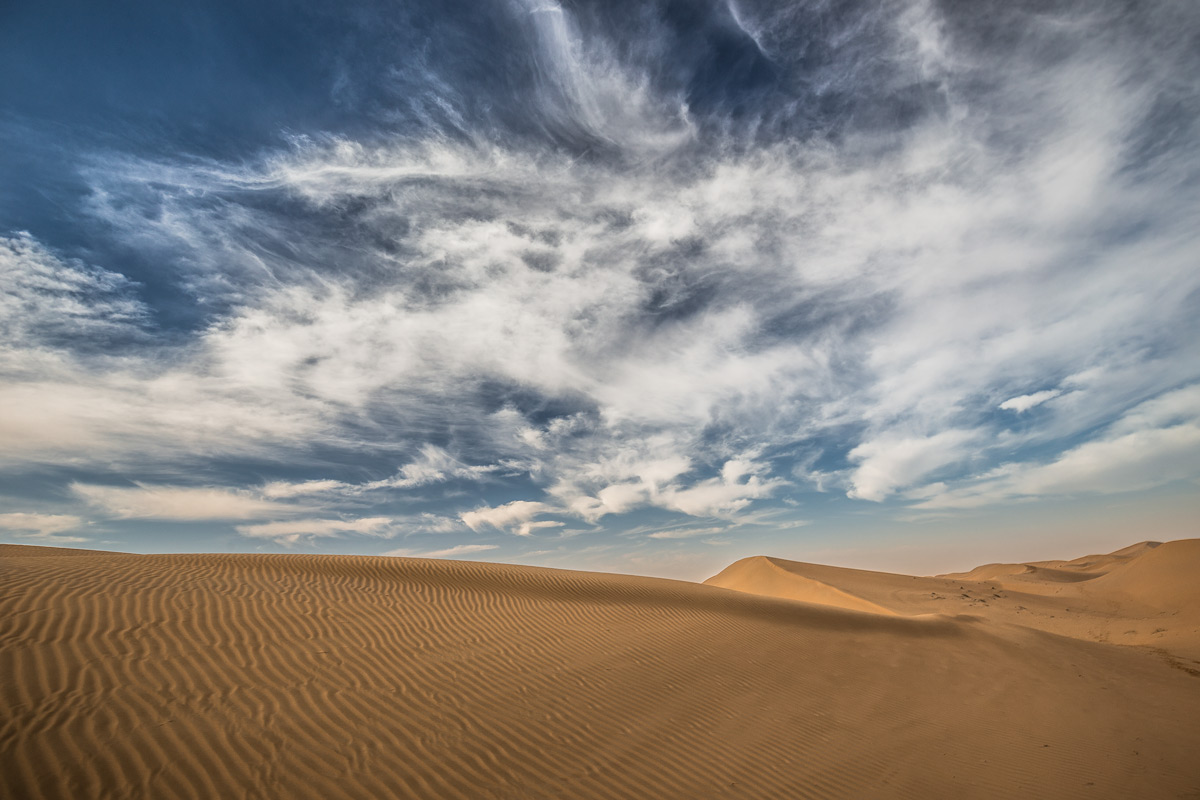 Brushing in the desert sky
