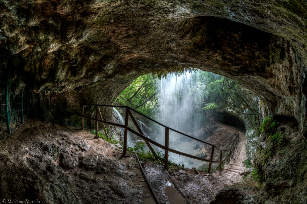 Behind the waterfall