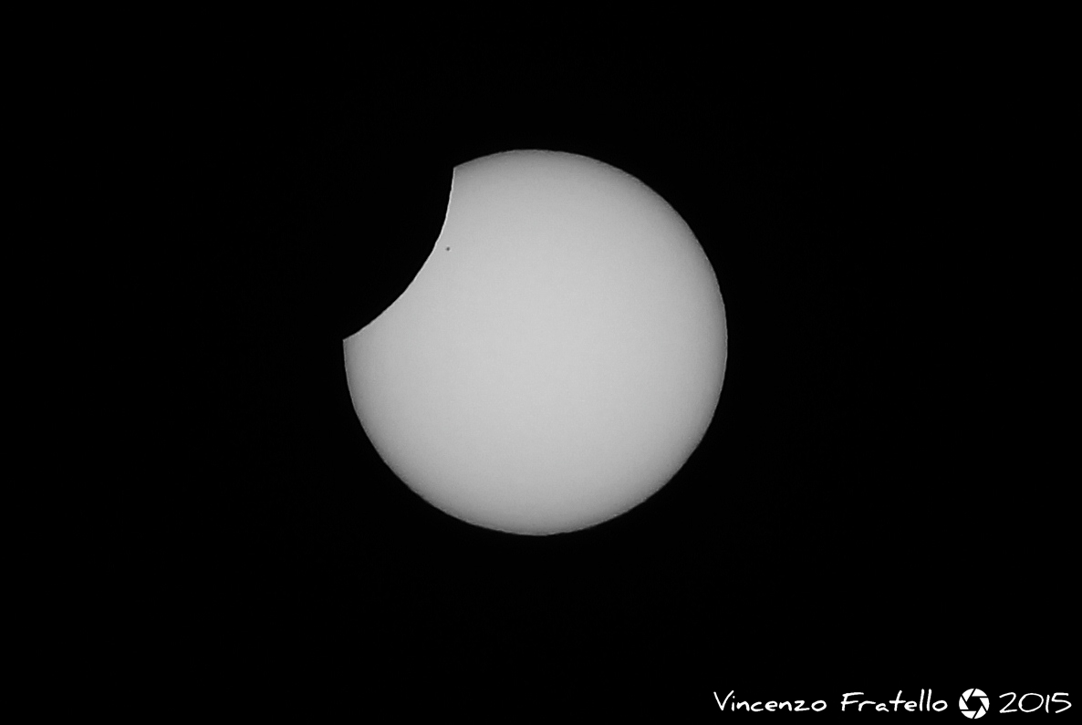 Eclissi con macchia solare