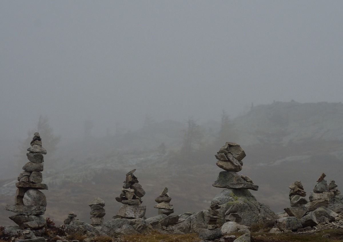 Stone men in the fog