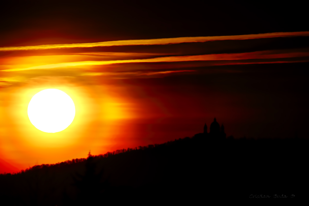 Superga, over the sun.