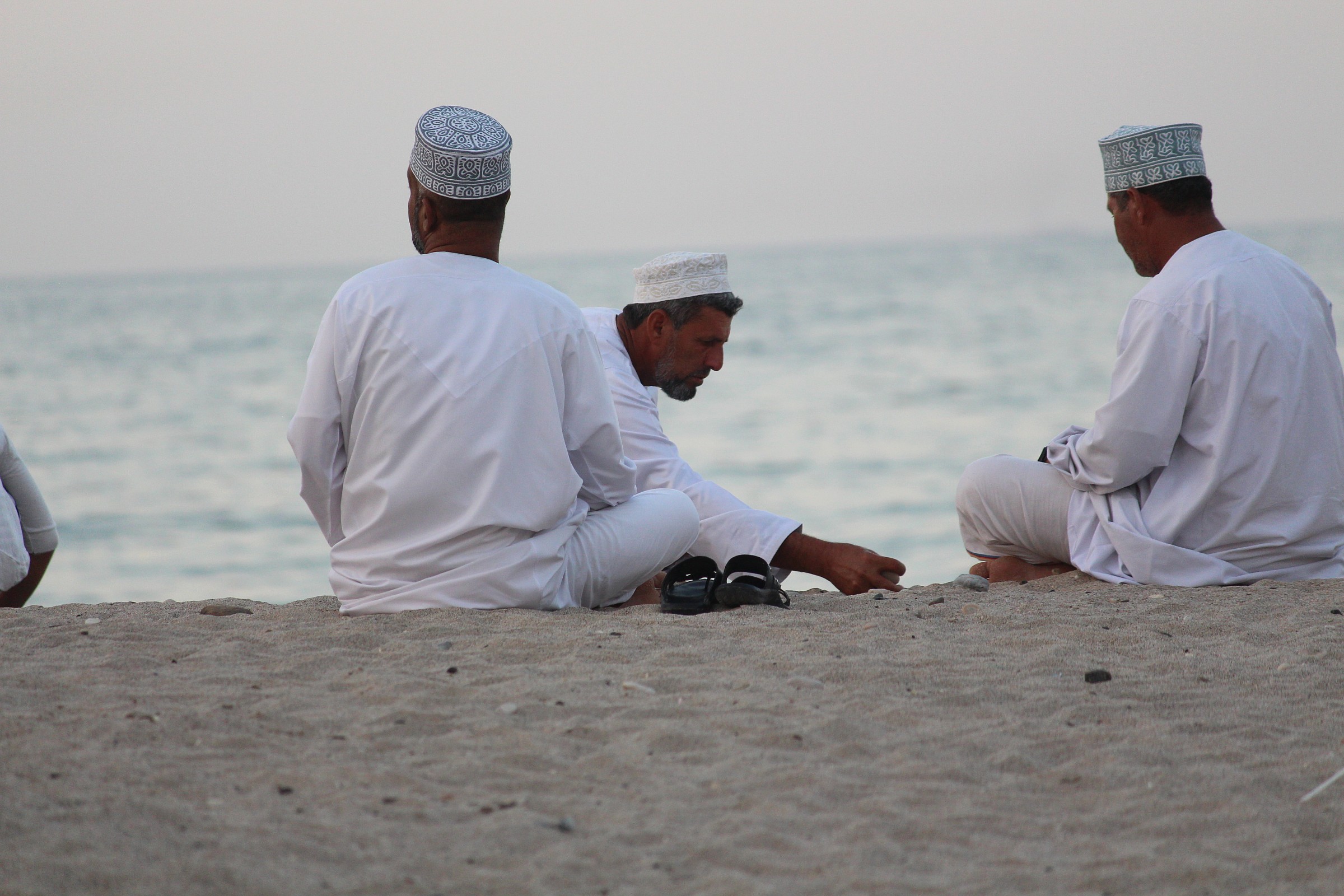Omanis on the beach playing