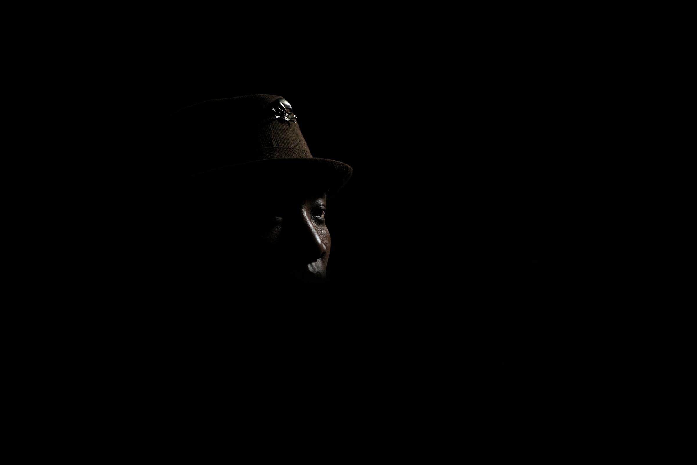 India: Nagaland: Man inside the hut.