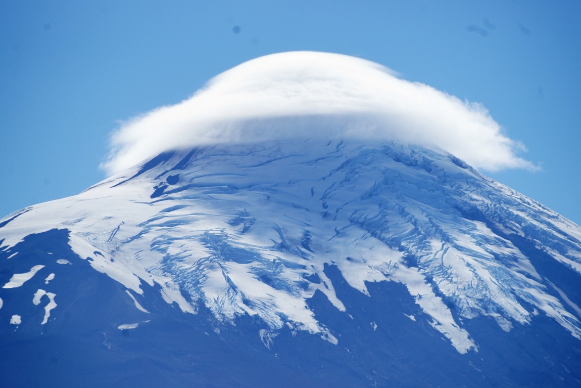 Osorno volcano cloaked in a single cloud