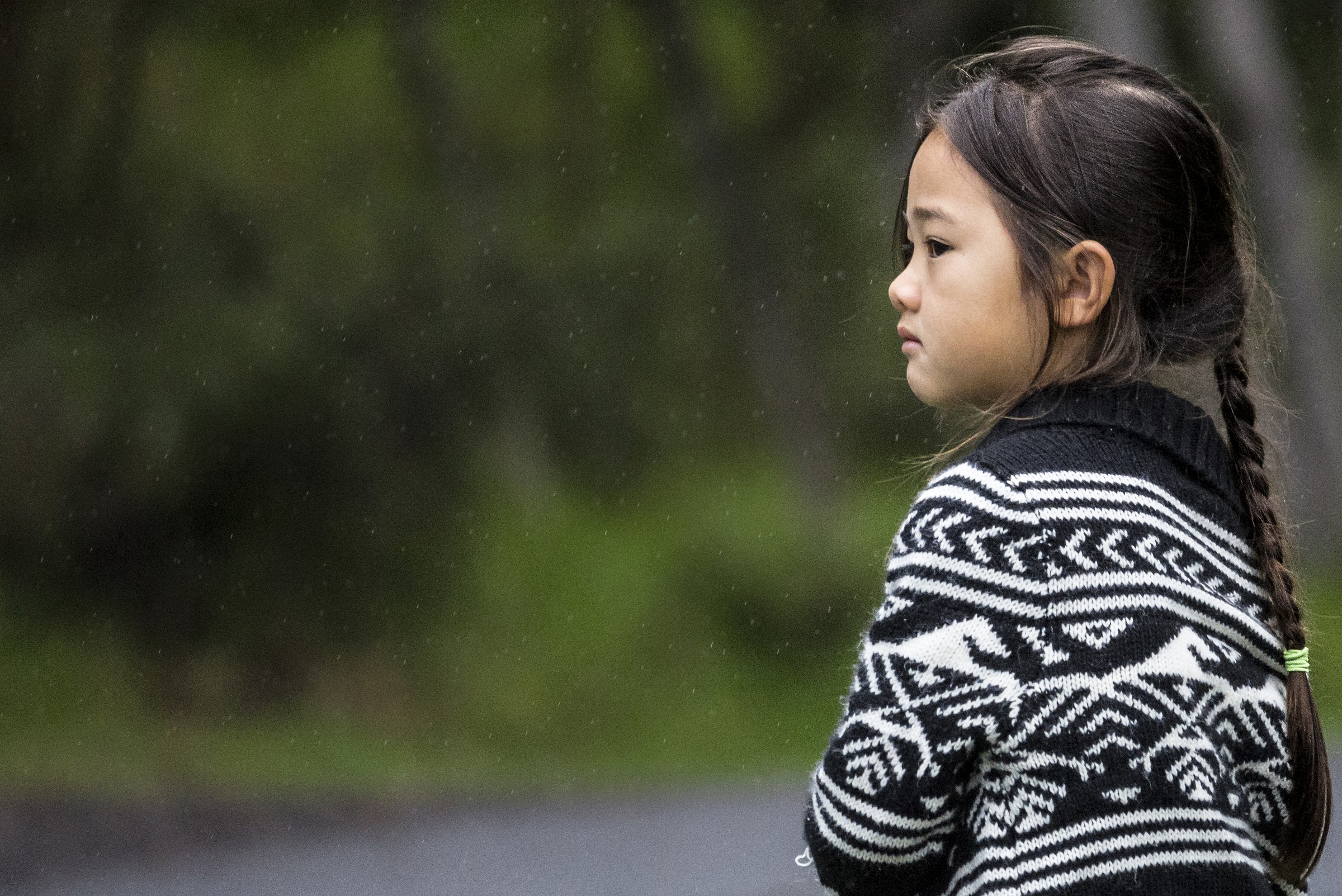 Polynesian girl under the rain