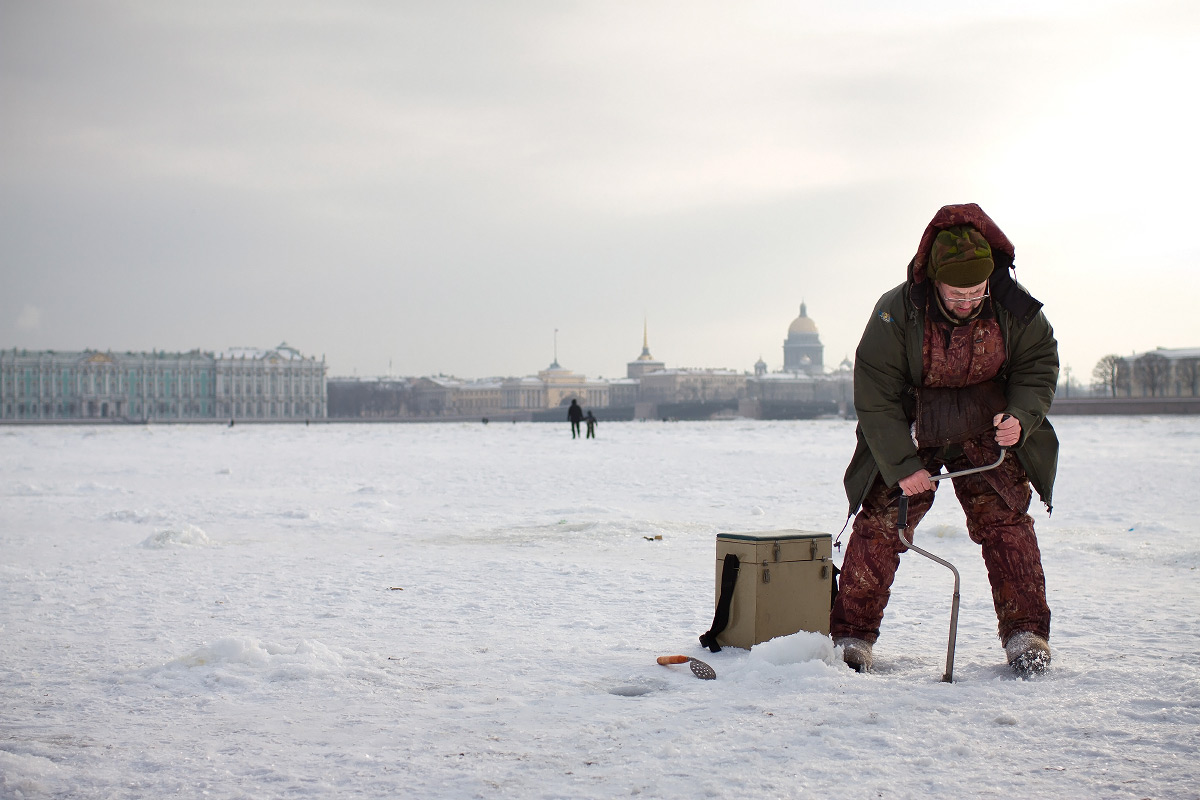 Fisherman on iced Neva river - Saint Petersburg