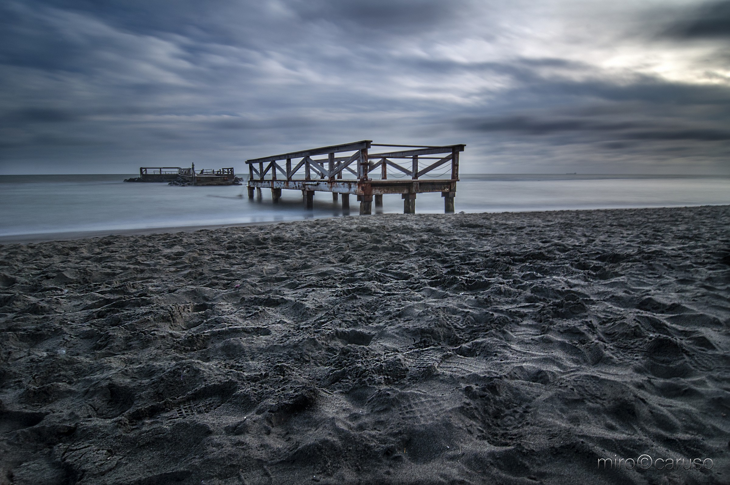 nuvole, mare e sabbia