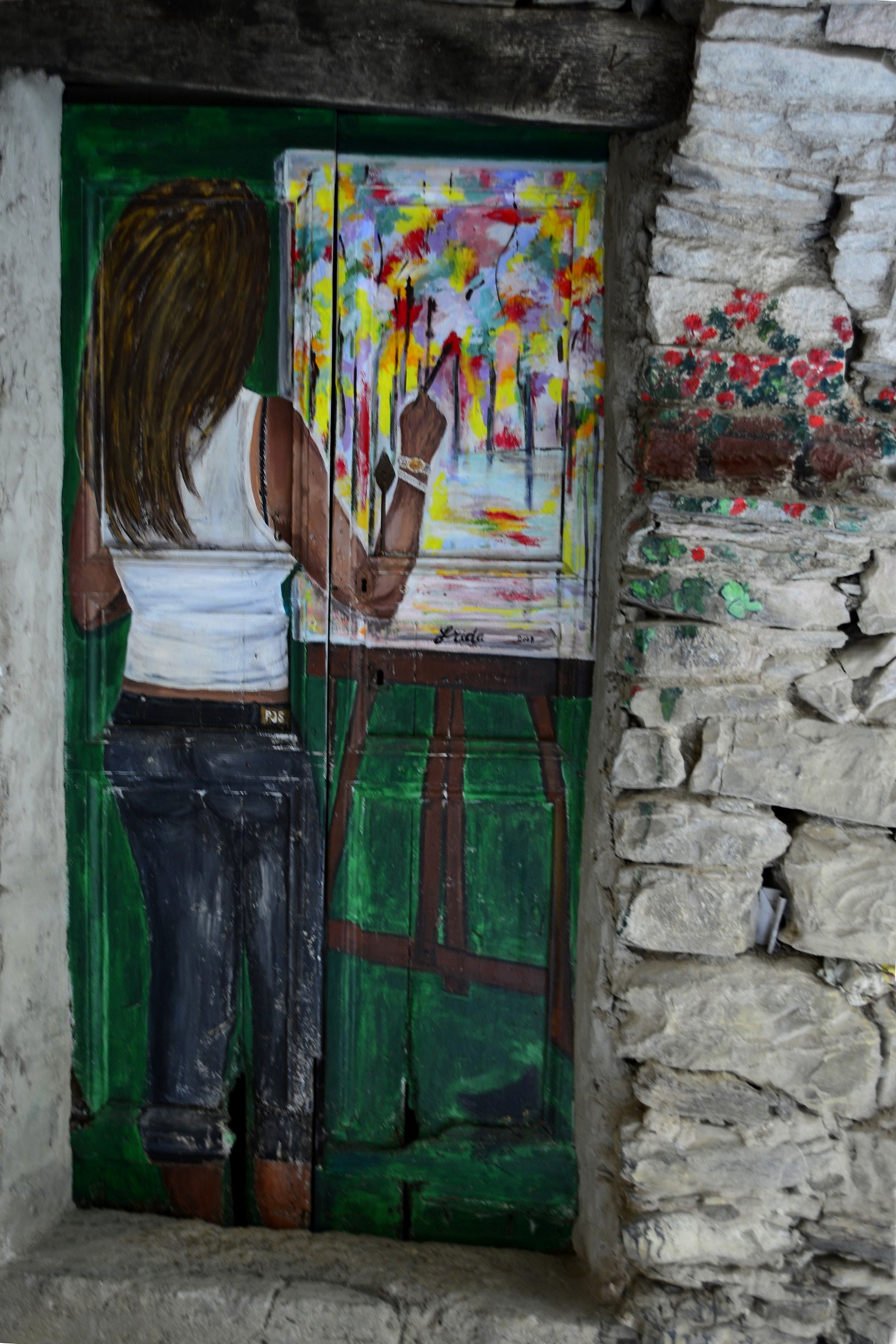 Porta dell'autrice che dipinge