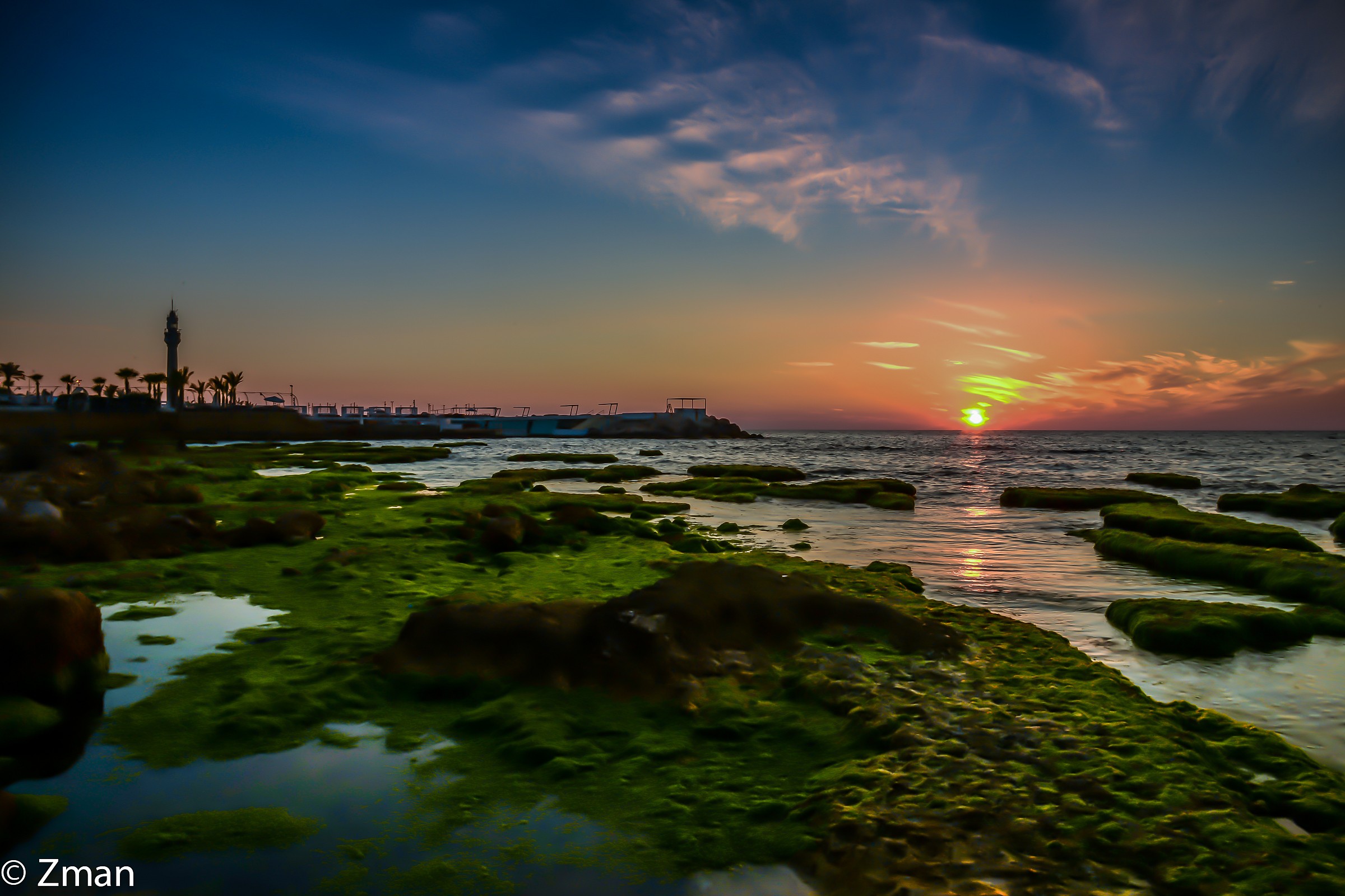 Al Manara Rocky Beach at Sunset