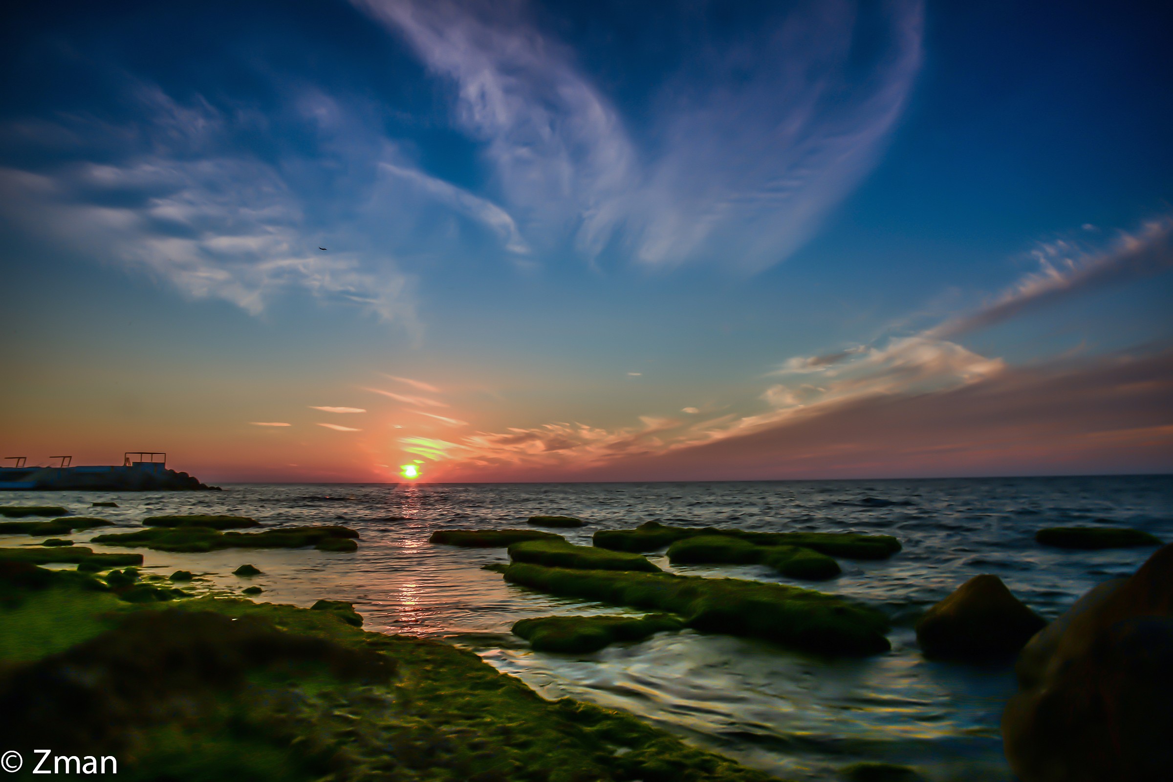 Al Manara Rocky Beach at Sunset