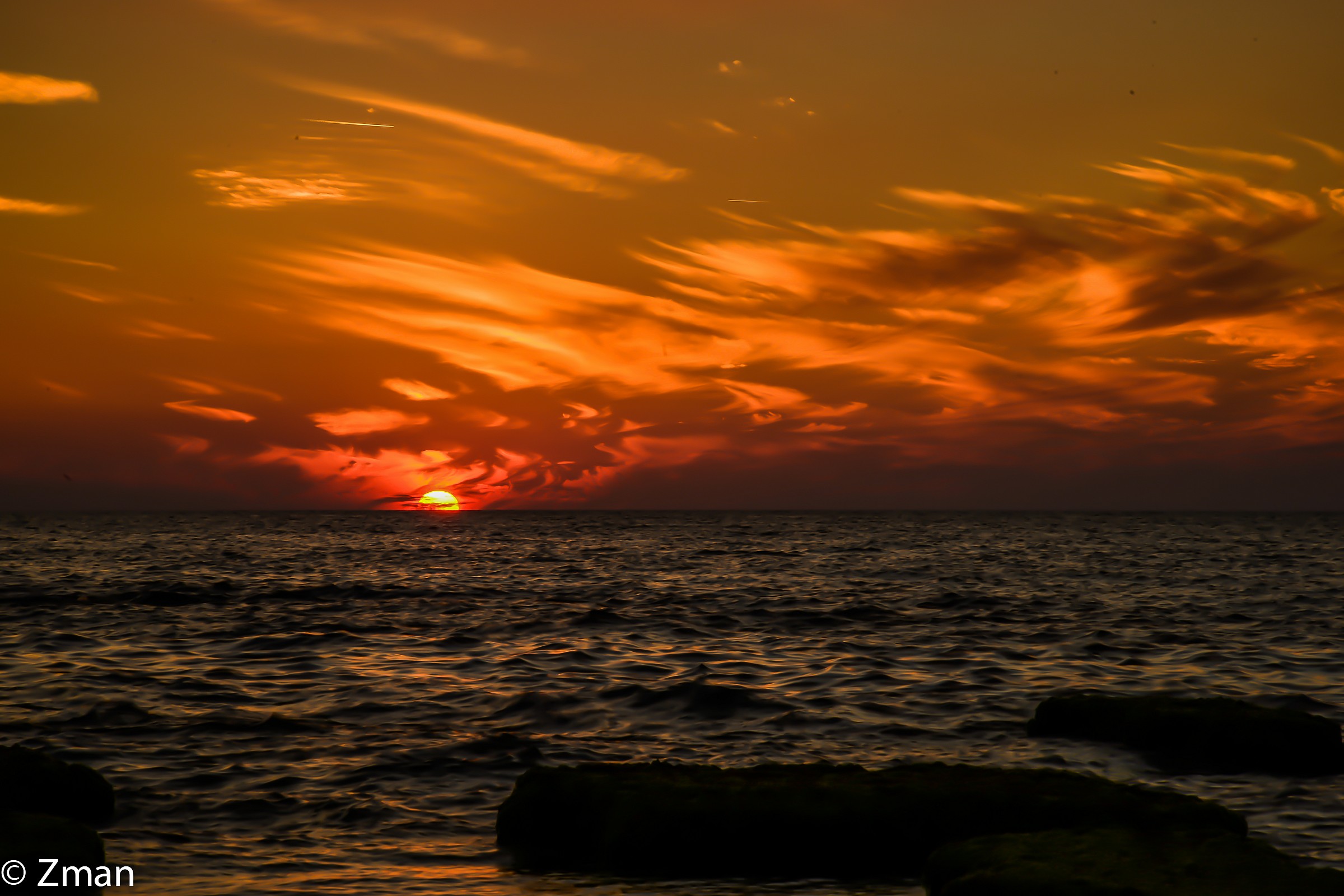 Al Manara Rocky Beach at Sunset
