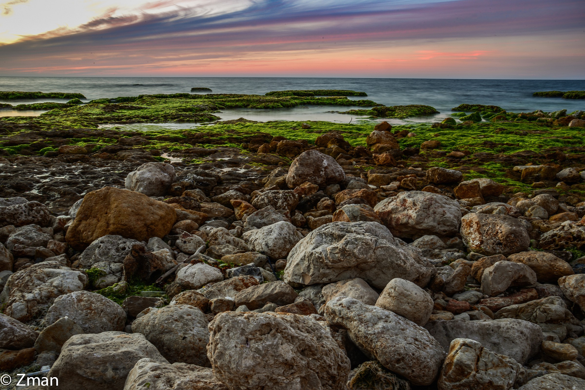 Al Manara Rocky Beach at Sunset