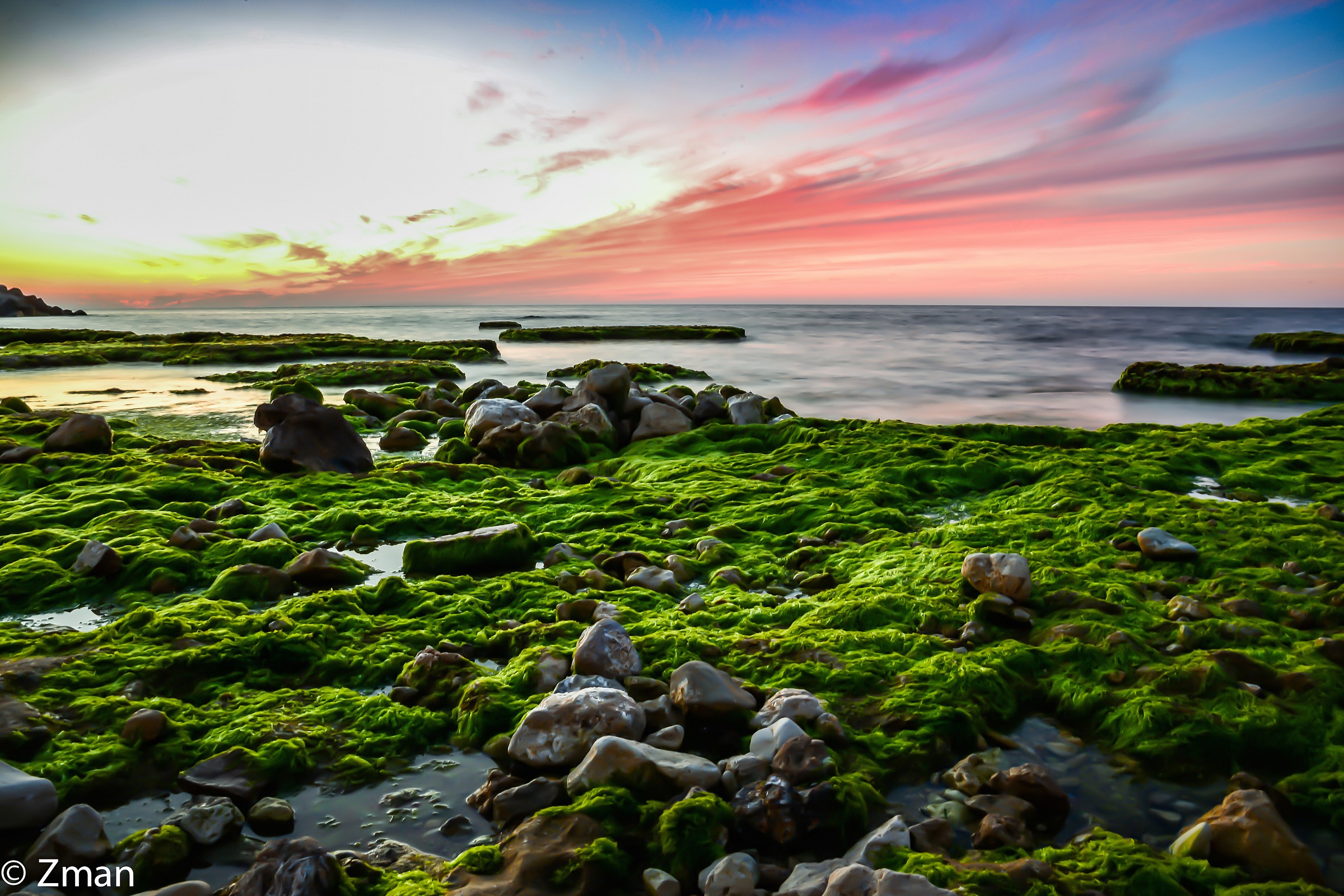 Al Manara Rocky Beach at Sunset