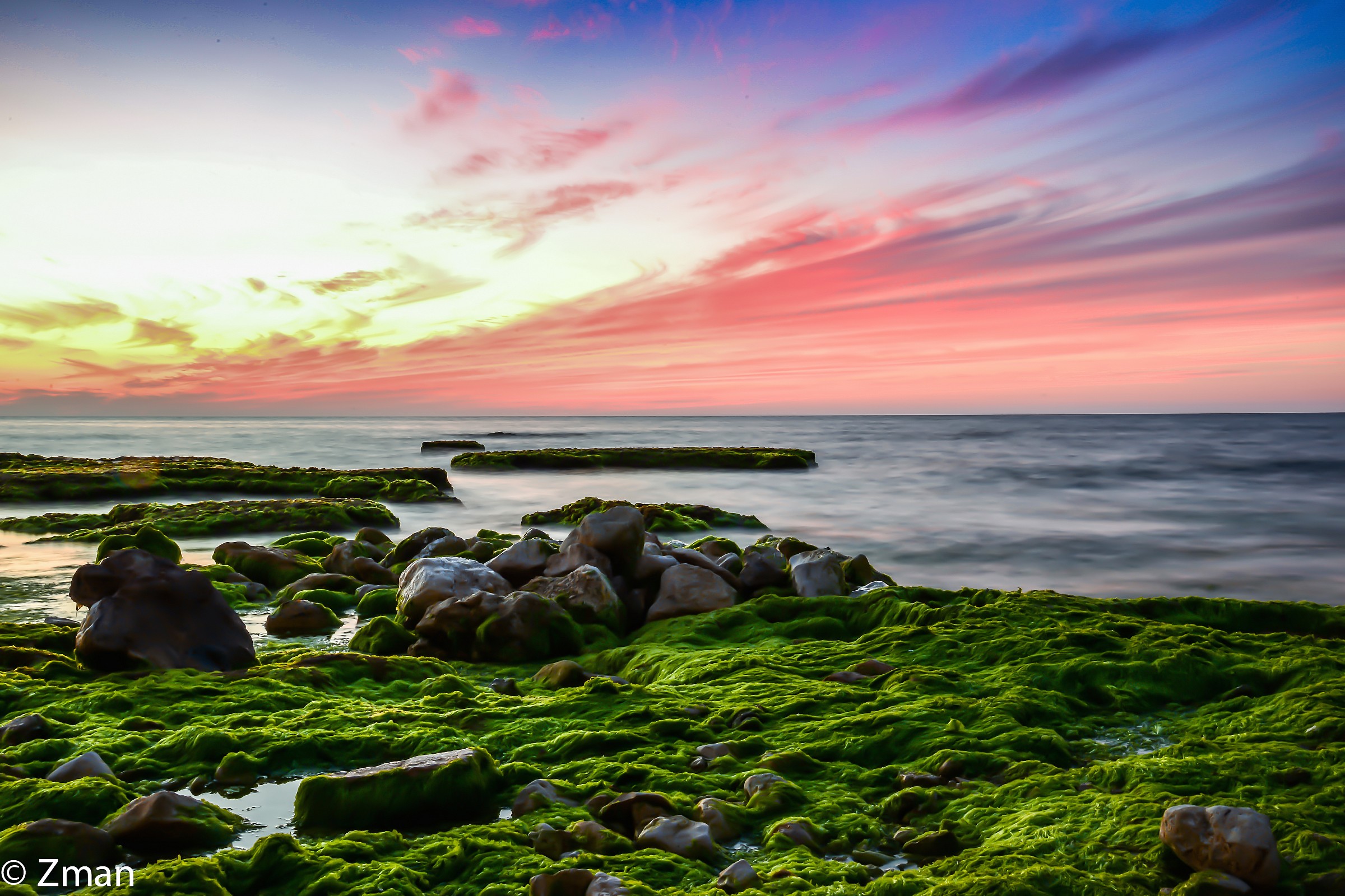 Al Manara Rocky Beach at Sunset