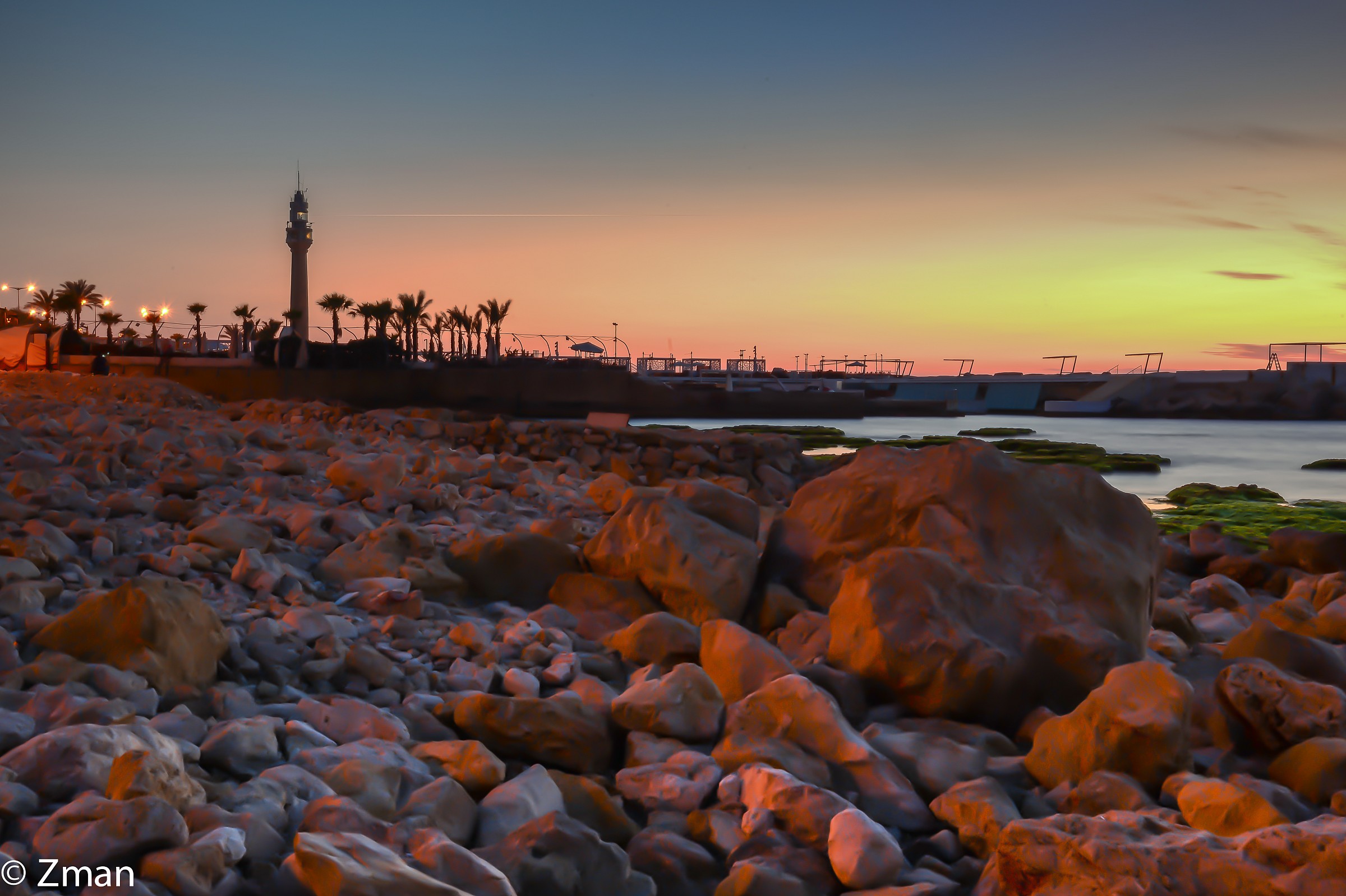 Al Manara Rocky Beach at Sunset