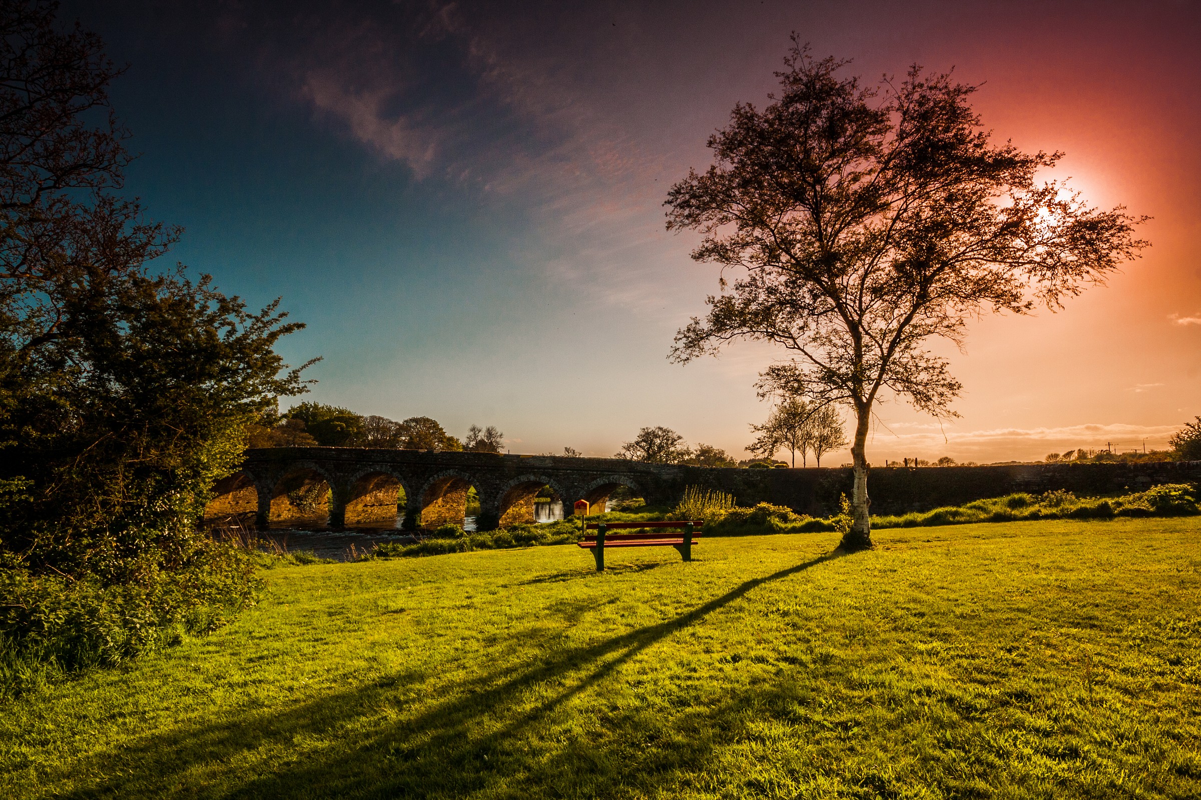sunset above the Ireland's bridge