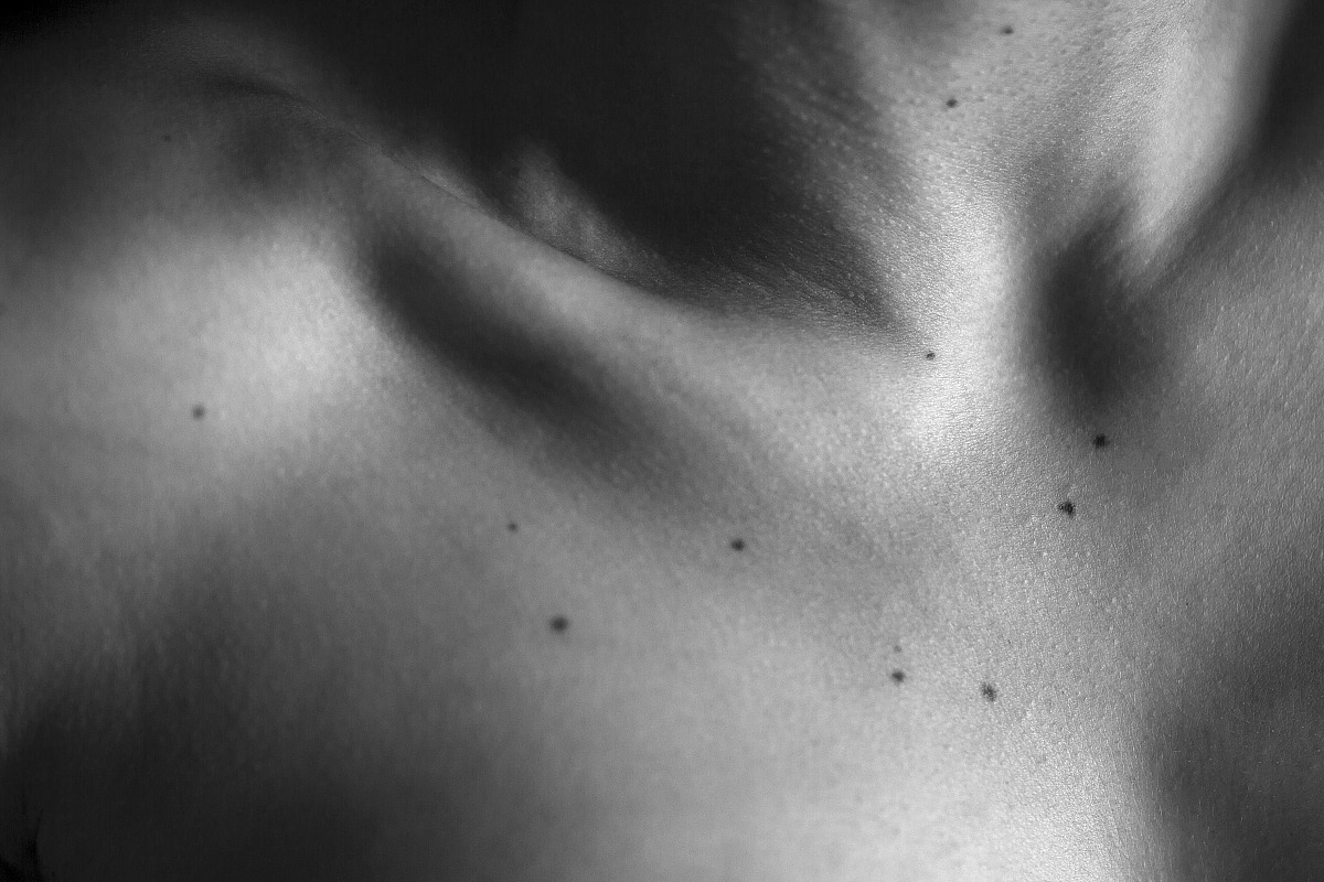 black stars in a white sky