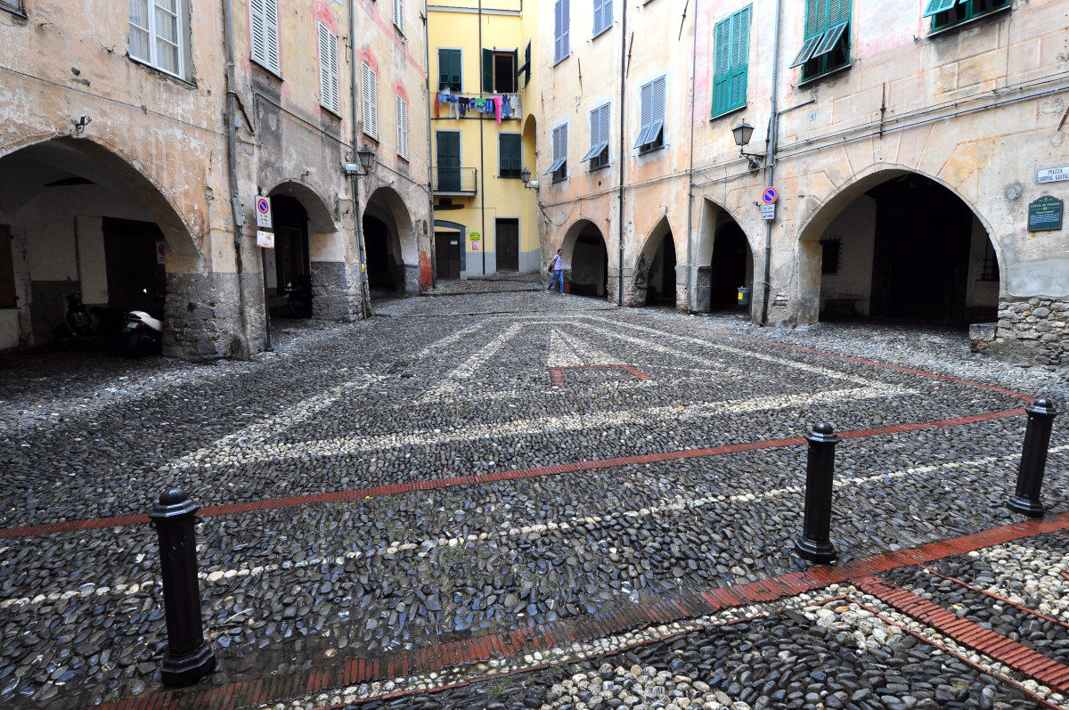 Square and medieval arcades in Taggia (Imperia)