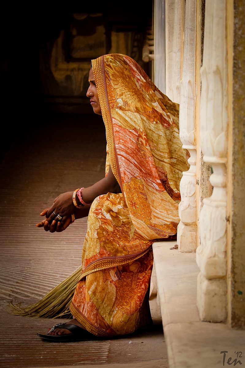 Indian woman with broom