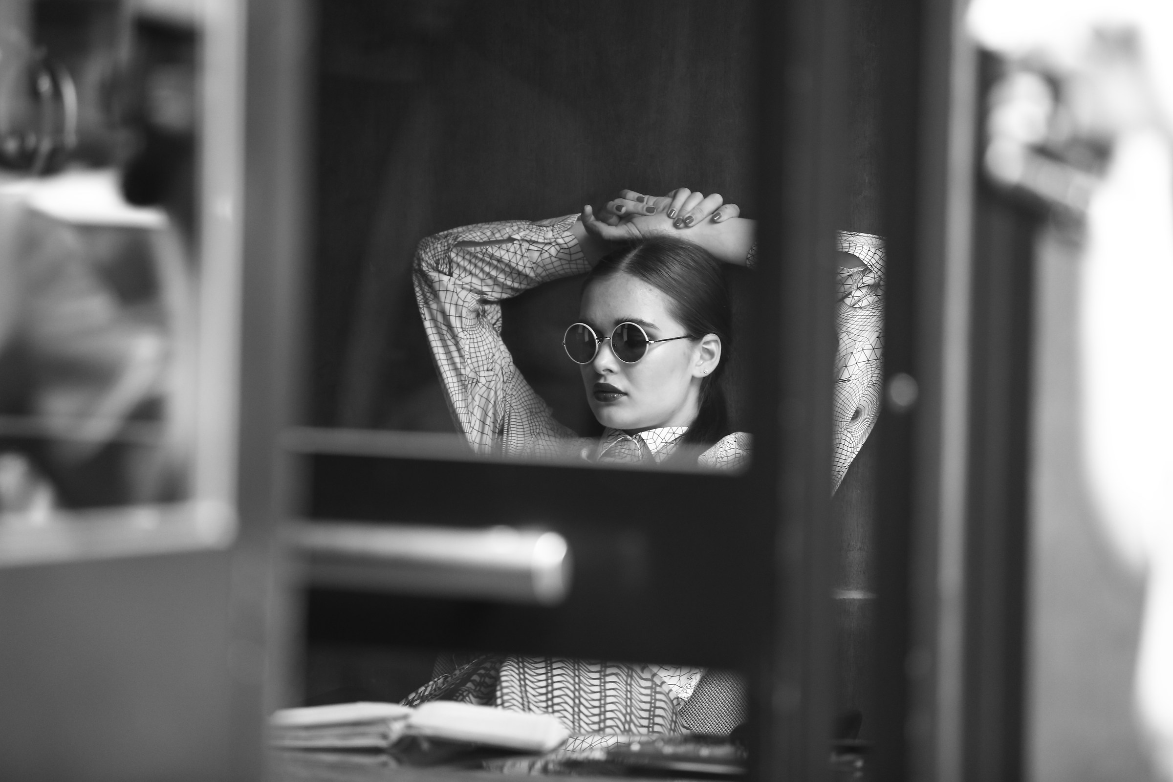 Among the reflections of a door