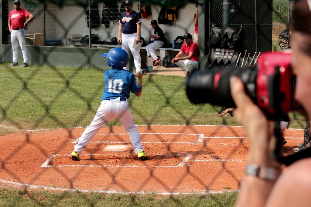 Baseball. .... Under crossfire.