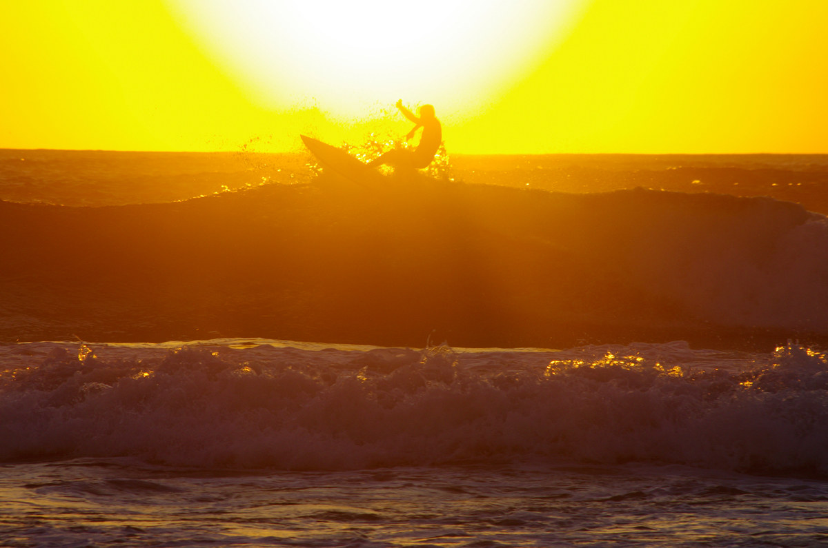 Surf at sunset in Porto Ferro