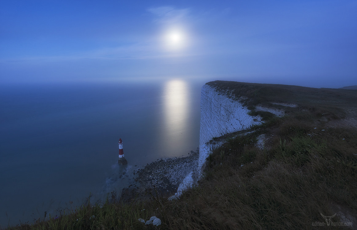 Beachy Head Lighthouse and full moon