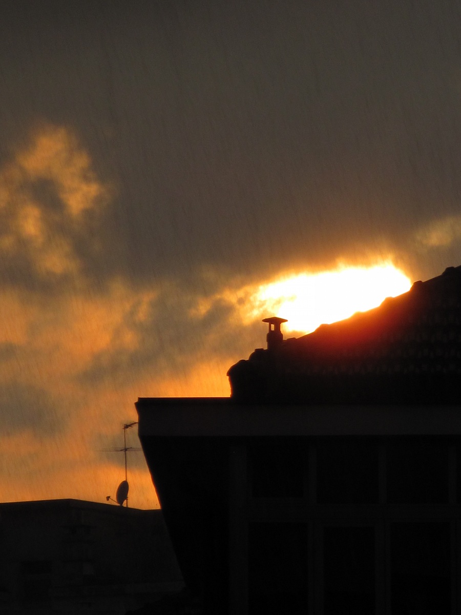 Tramonto con pioggia