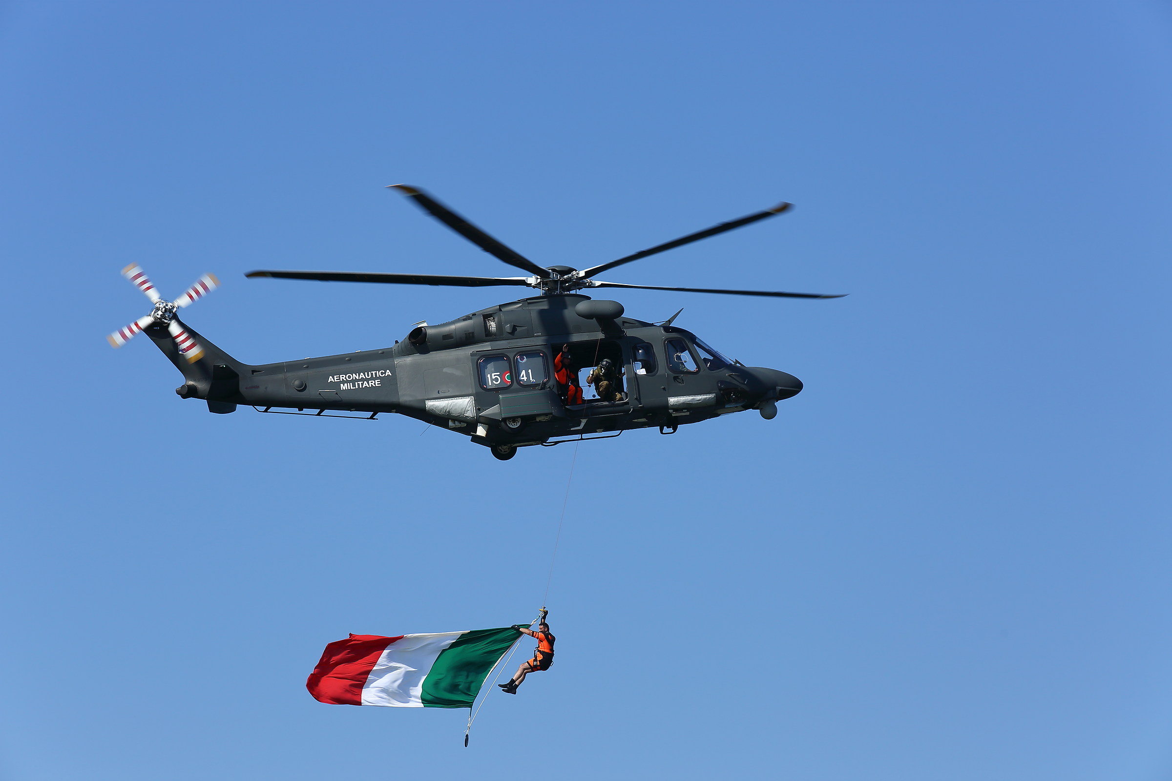 Clinging to the tricolor flag